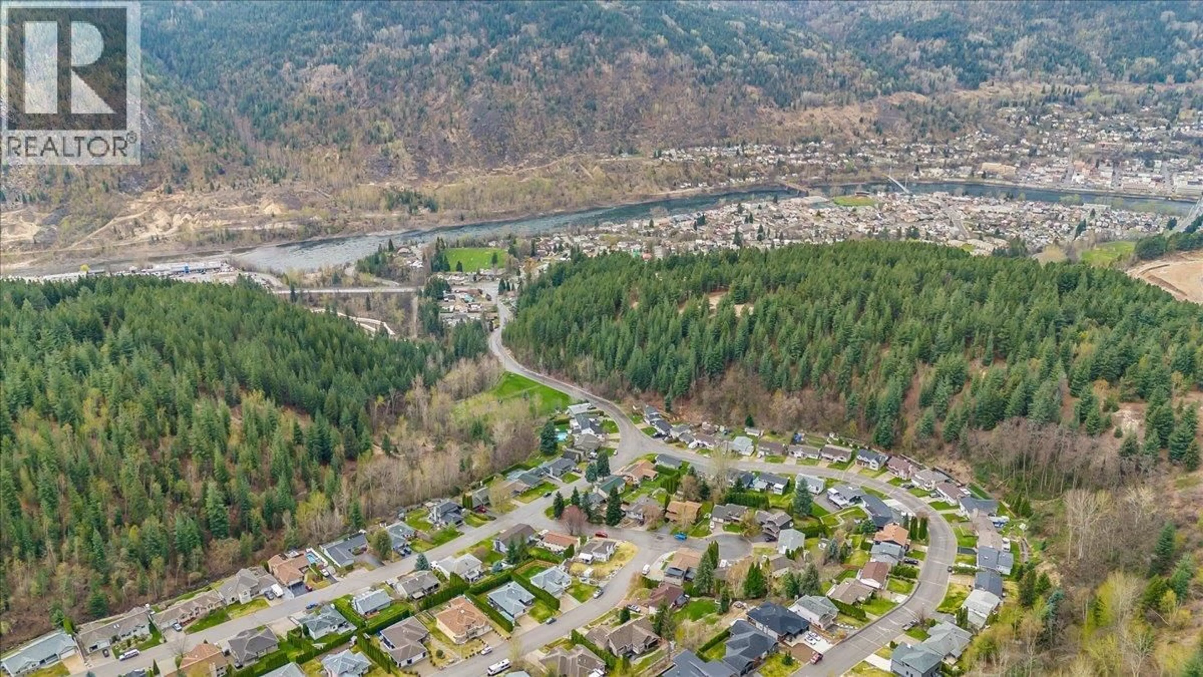 A pic from outside/outdoor area/front of a property/back of a property/a pic from drone, mountain view for 2455 COLIN CRESCENT, Trail British Columbia V1R4T4