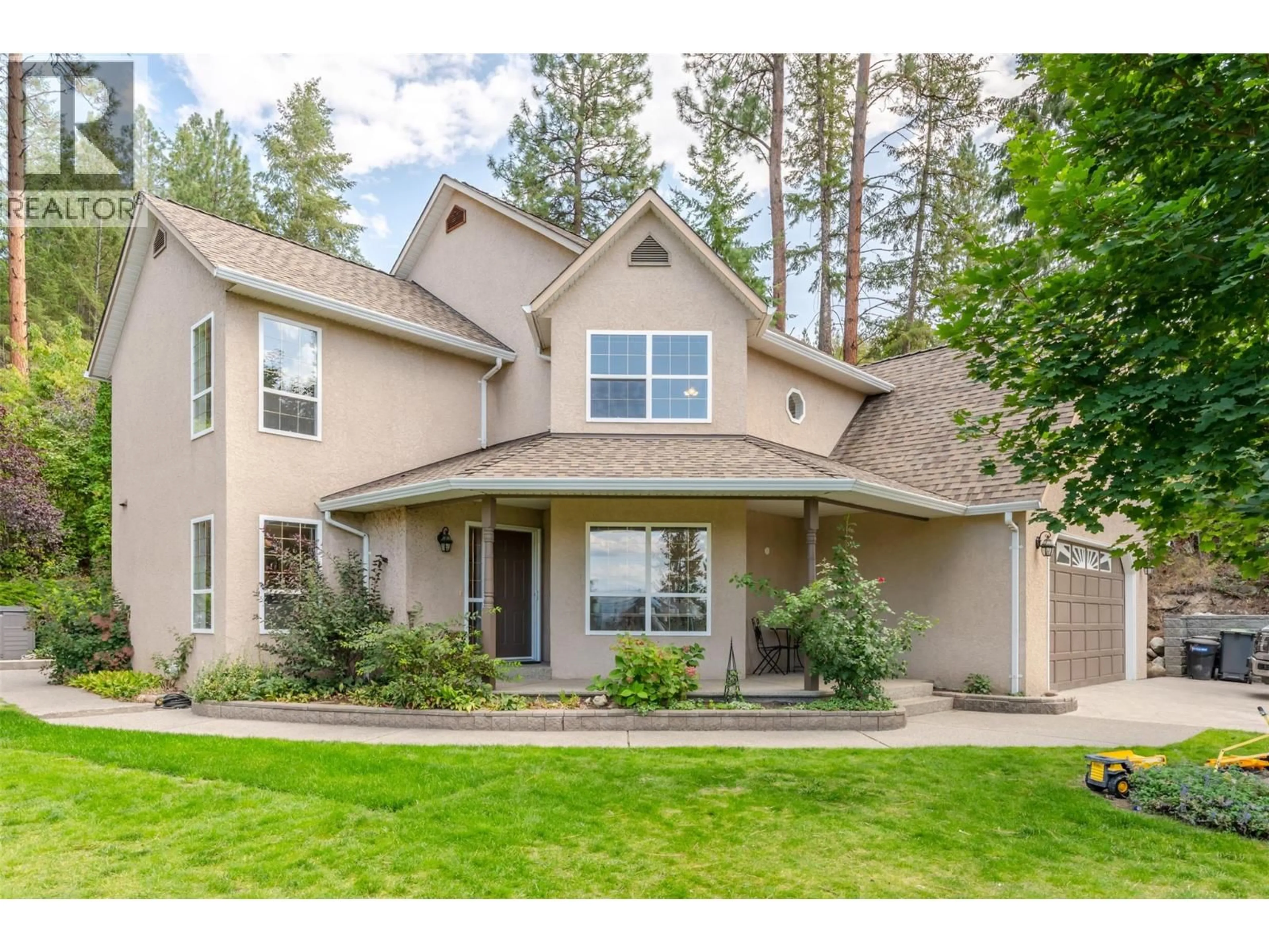 Home with vinyl exterior material, street for 3281 JUNIPER DRIVE, Naramata British Columbia V0H1N1