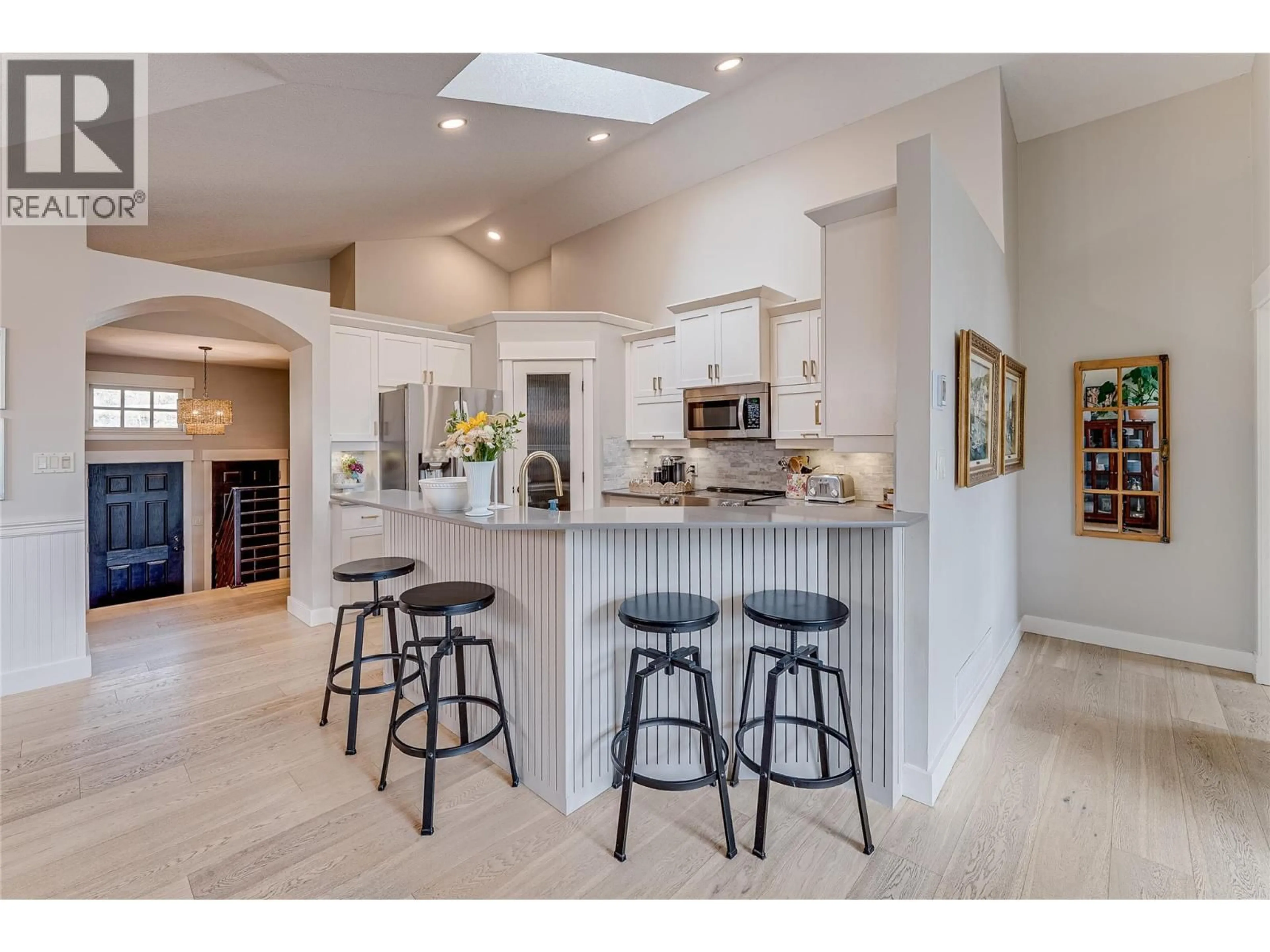 Open concept kitchen, ceramic/tile floor for 1 - 6933 MANNING PLACE, Vernon British Columbia V1B2Y6
