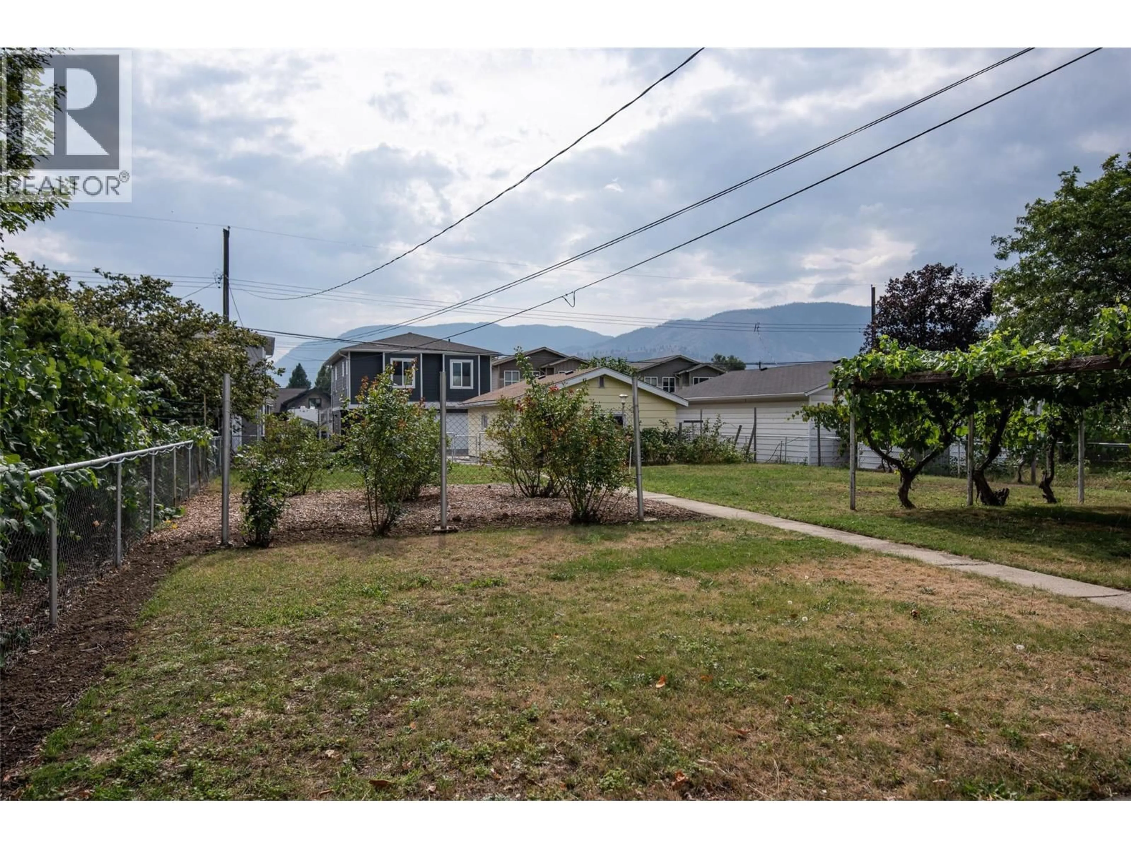 A pic from outside/outdoor area/front of a property/back of a property/a pic from drone, mountain view for 376 CONKLIN AVENUE, Penticton British Columbia V2A2T4