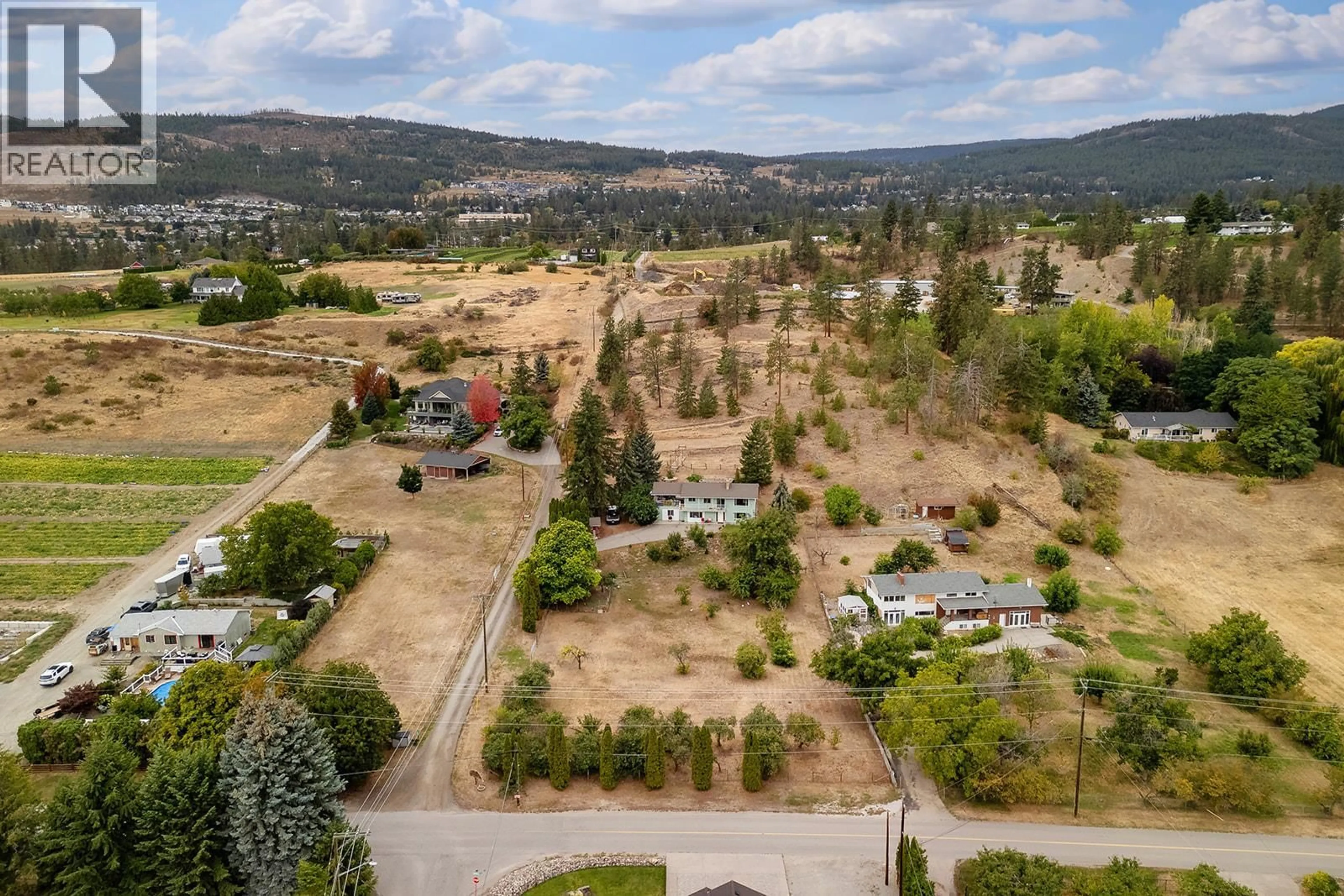 A pic from outside/outdoor area/front of a property/back of a property/a pic from drone, mountain view for 3490 PAYNTER ROAD, West Kelowna British Columbia V4T1R2