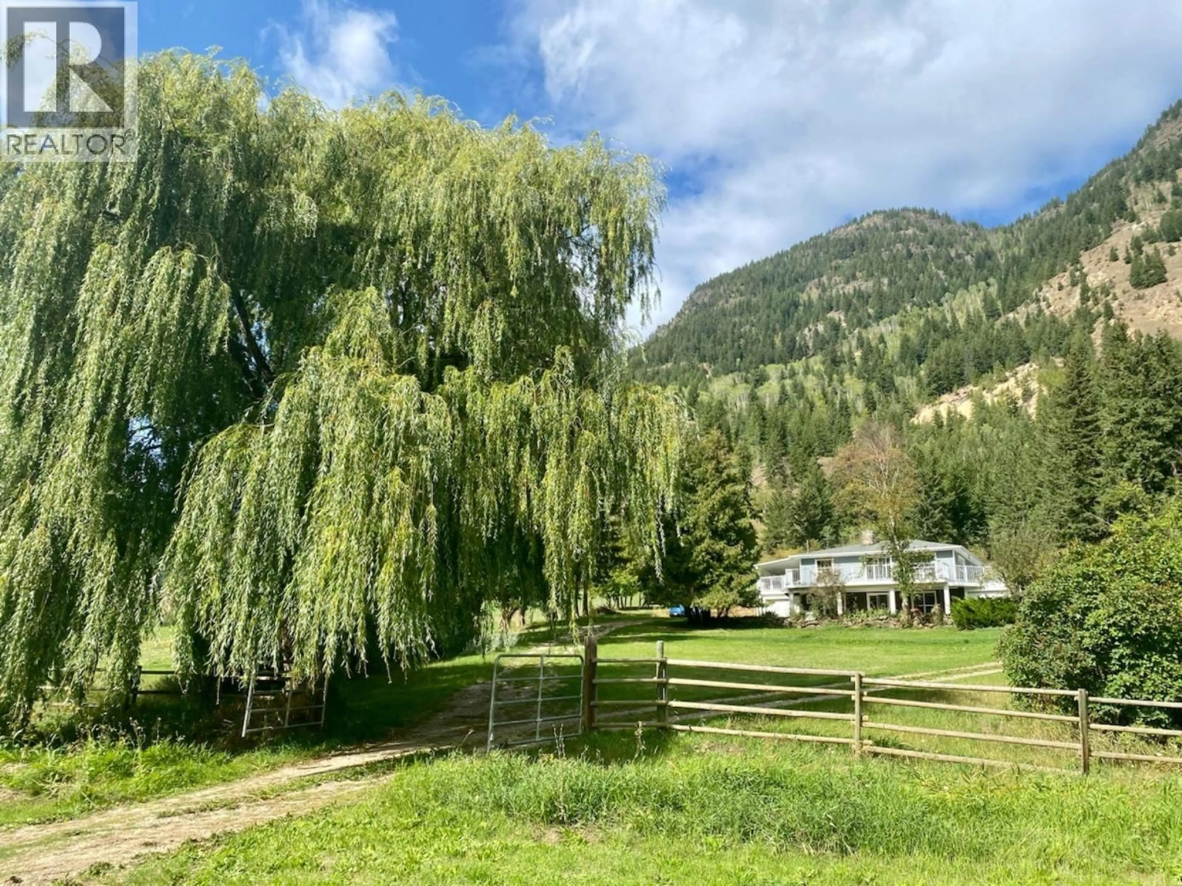 A pic from outside/outdoor area/front of a property/back of a property/a pic from drone, mountain view for 400 AGATE BAY ROAD, Barriere British Columbia V0E2E0
