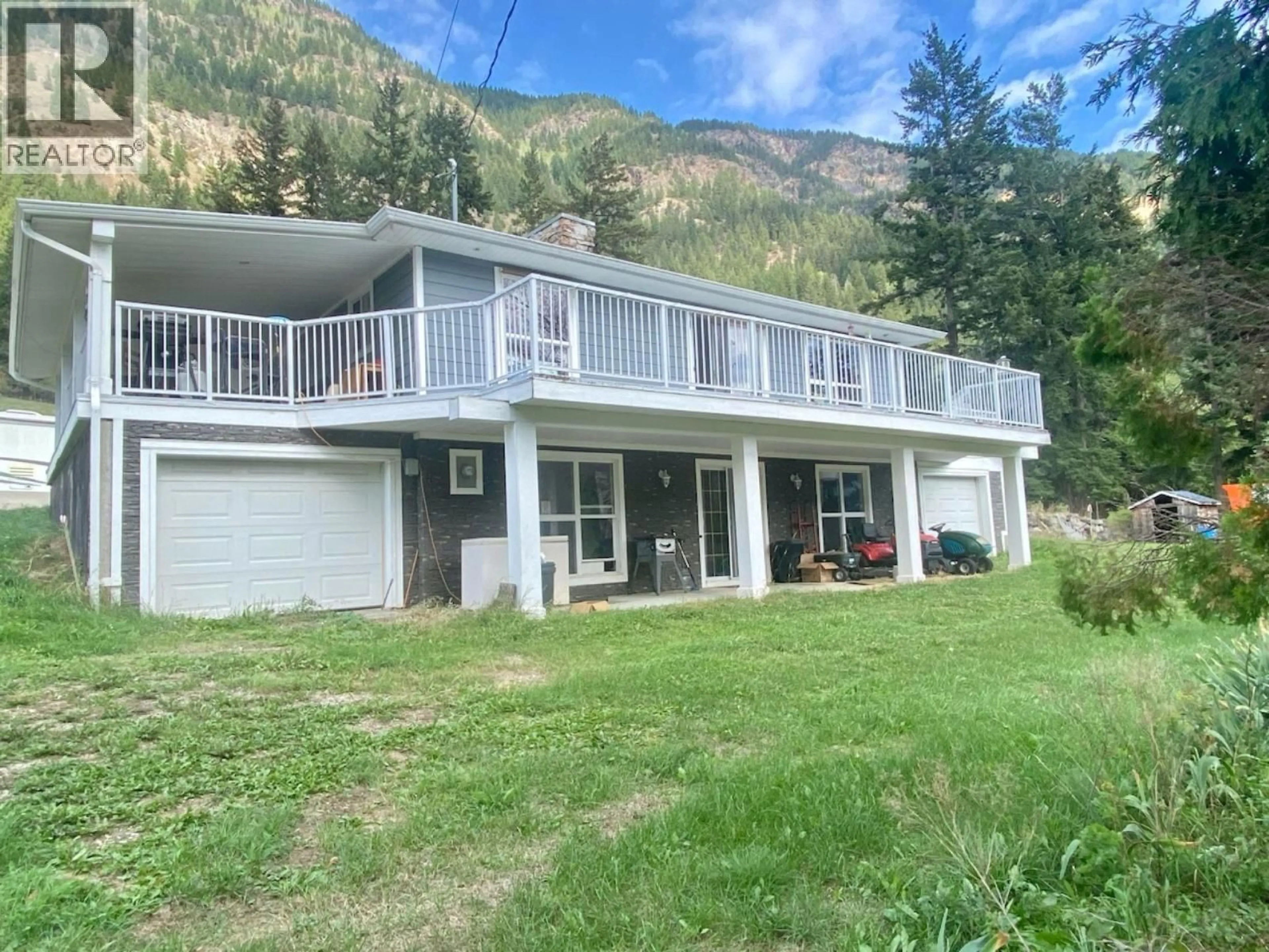A pic from outside/outdoor area/front of a property/back of a property/a pic from drone, water/lake/river/ocean view for 400 AGATE BAY ROAD, Barriere British Columbia V0E2E0