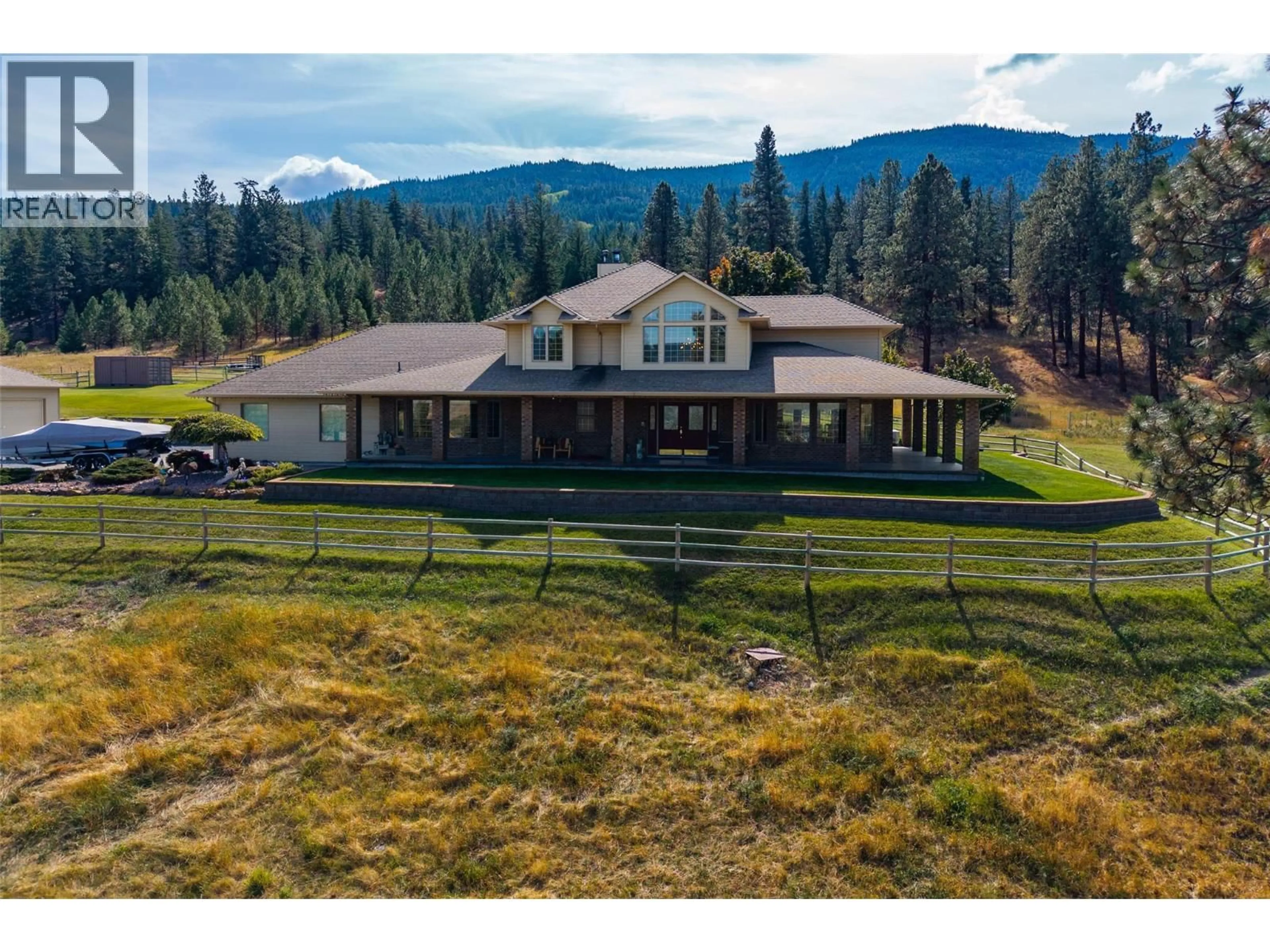 A pic from outside/outdoor area/front of a property/back of a property/a pic from drone, mountain view for 3088 FOX FARM ROAD, Merritt British Columbia V1K1B8