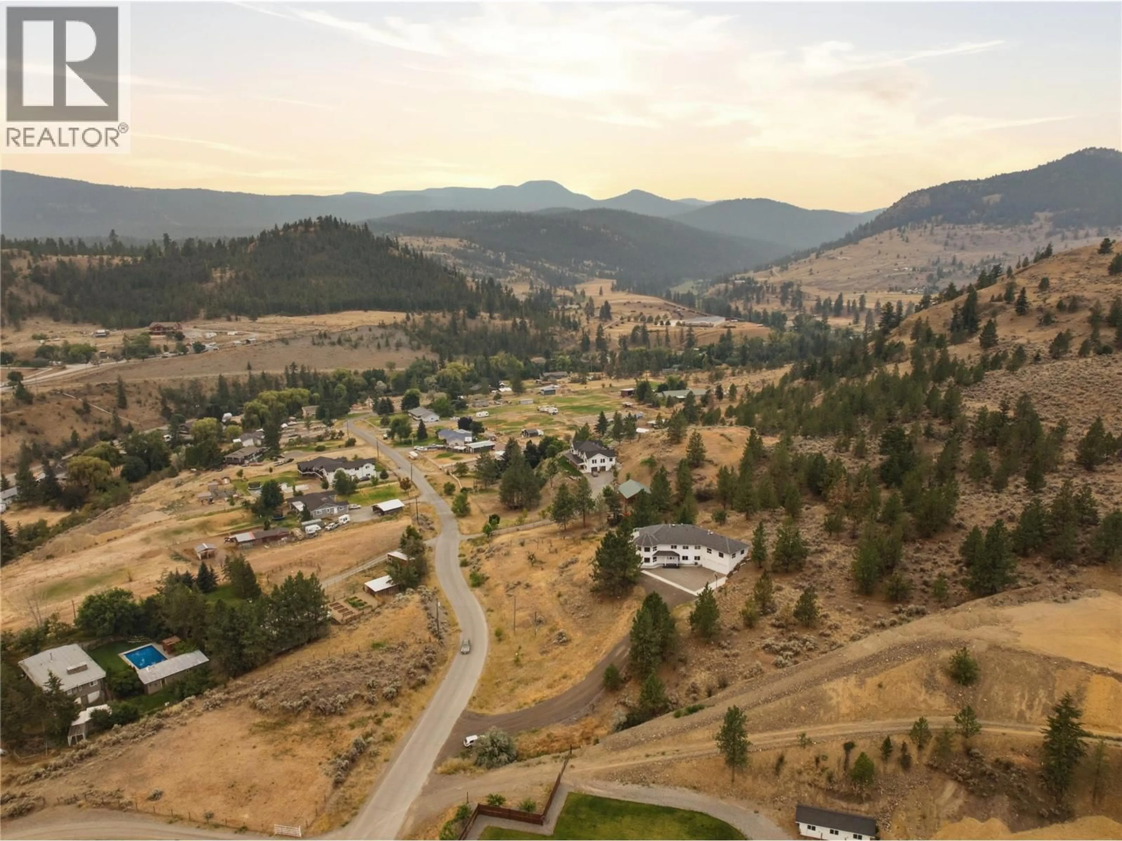 A pic from outside/outdoor area/front of a property/back of a property/a pic from drone, mountain view for 7035 BLACKWELL ROAD, Kamloops British Columbia V2C6V8