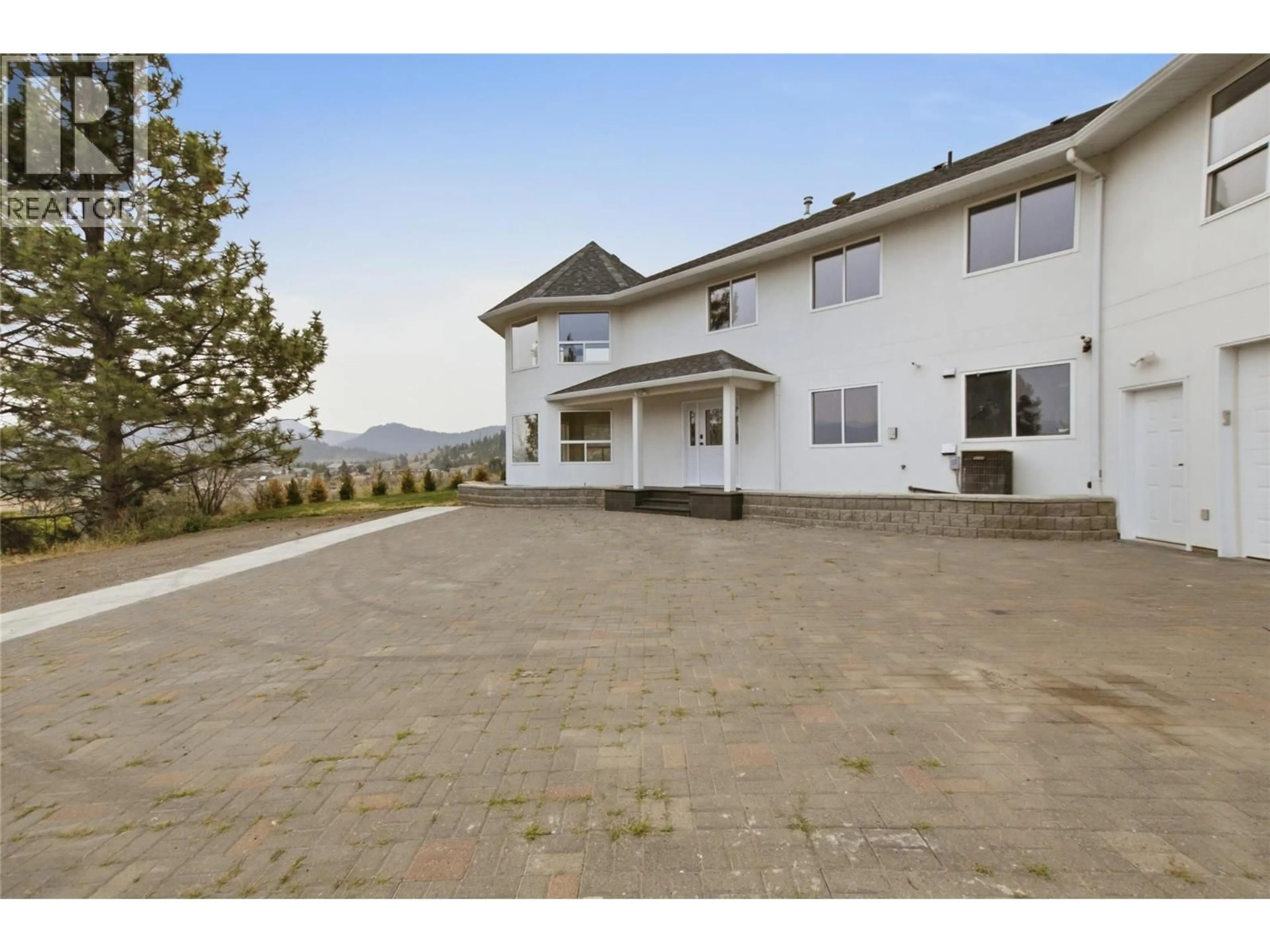 A pic from outside/outdoor area/front of a property/back of a property/a pic from drone, mountain view for 7035 BLACKWELL ROAD, Kamloops British Columbia V2C6V8