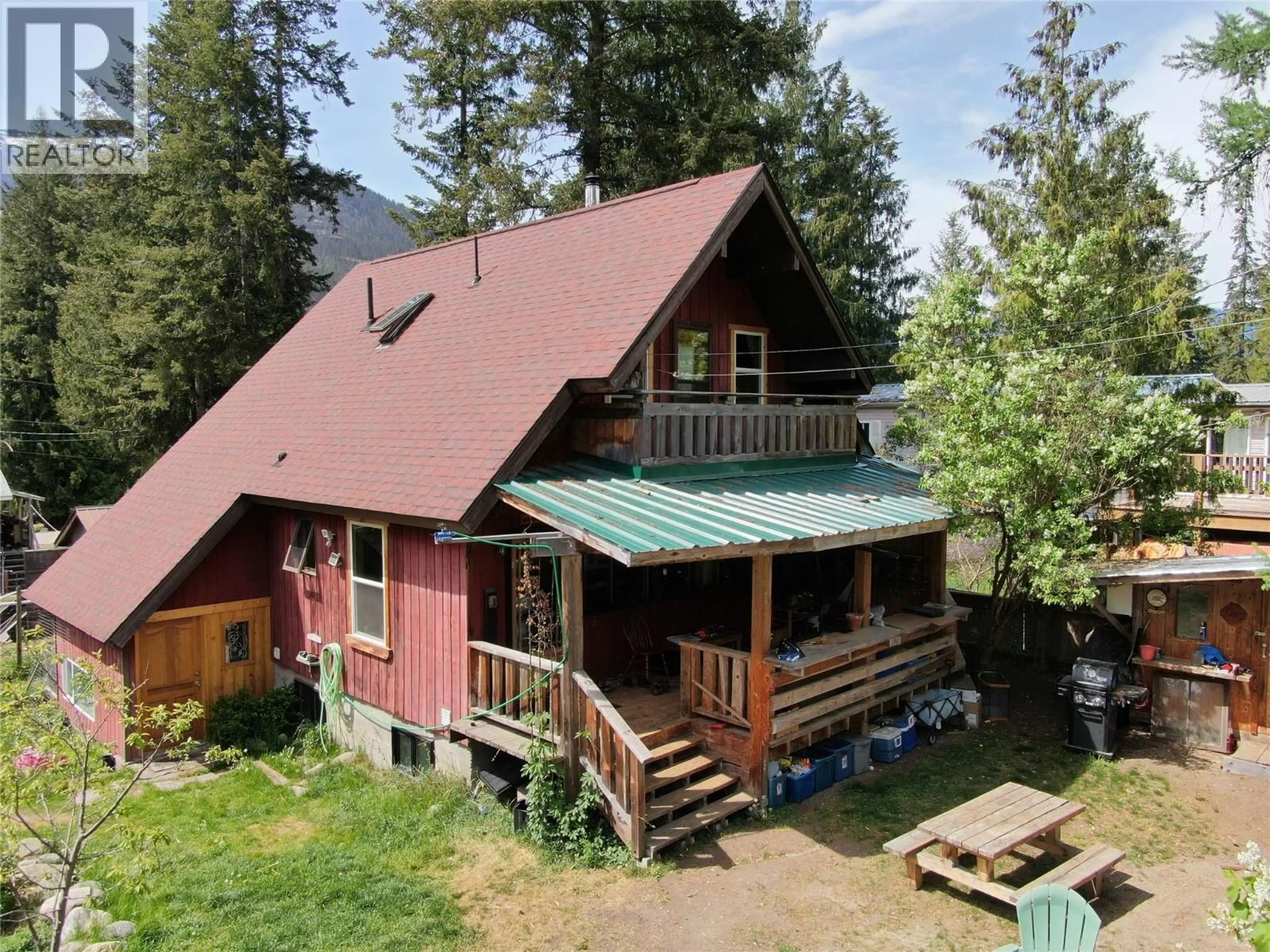 A pic from outside/outdoor area/front of a property/back of a property/a pic from drone, mountain view for 1013 SLOCAN STREET, Slocan British Columbia V1L2C0
