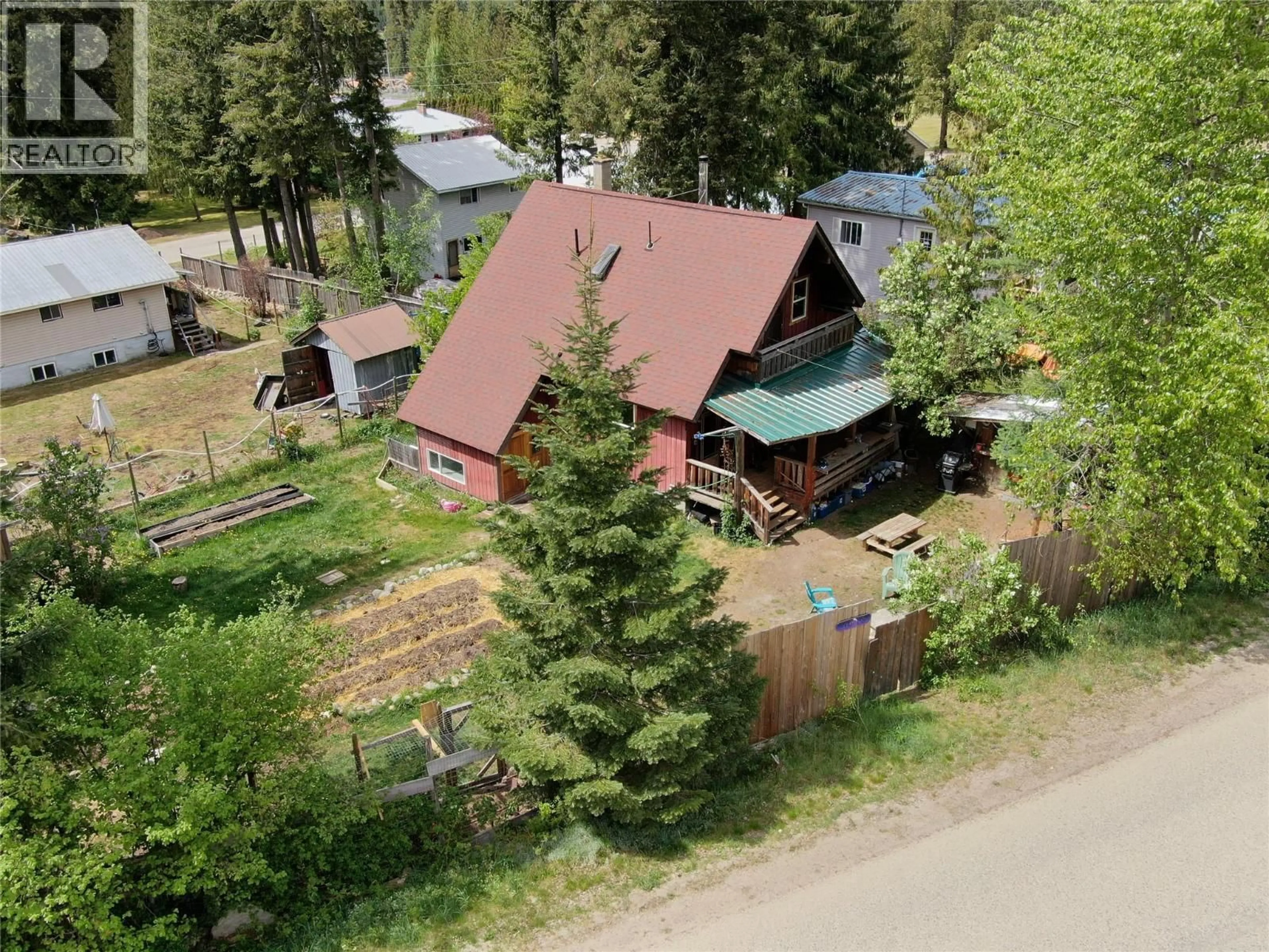 A pic from outside/outdoor area/front of a property/back of a property/a pic from drone, mountain view for 1013 SLOCAN STREET, Slocan British Columbia V1L2C0