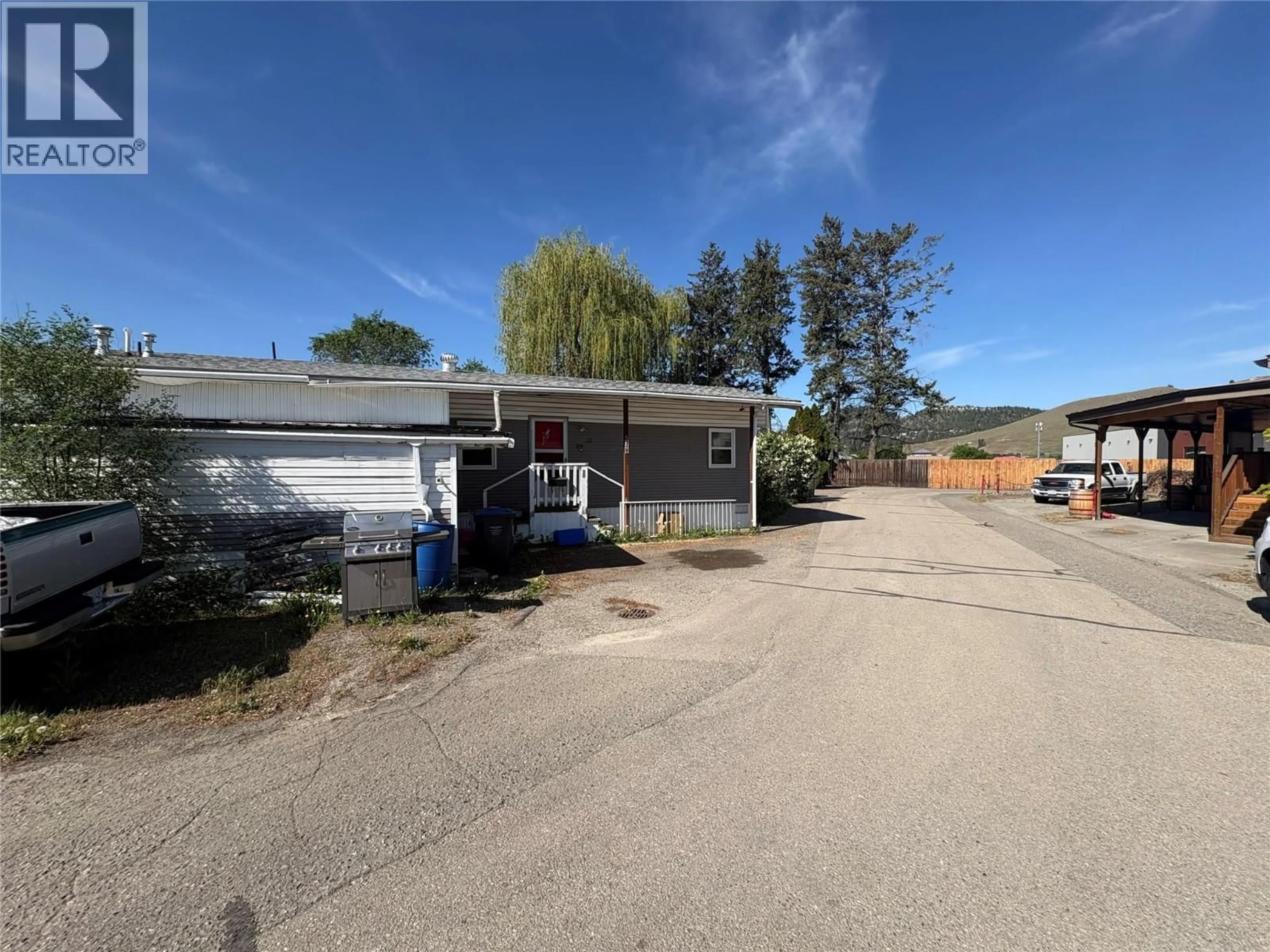 A pic from outside/outdoor area/front of a property/back of a property/a pic from drone, street for 30 - 1132 FINDLAY ROAD, Kelowna British Columbia V1X5A8