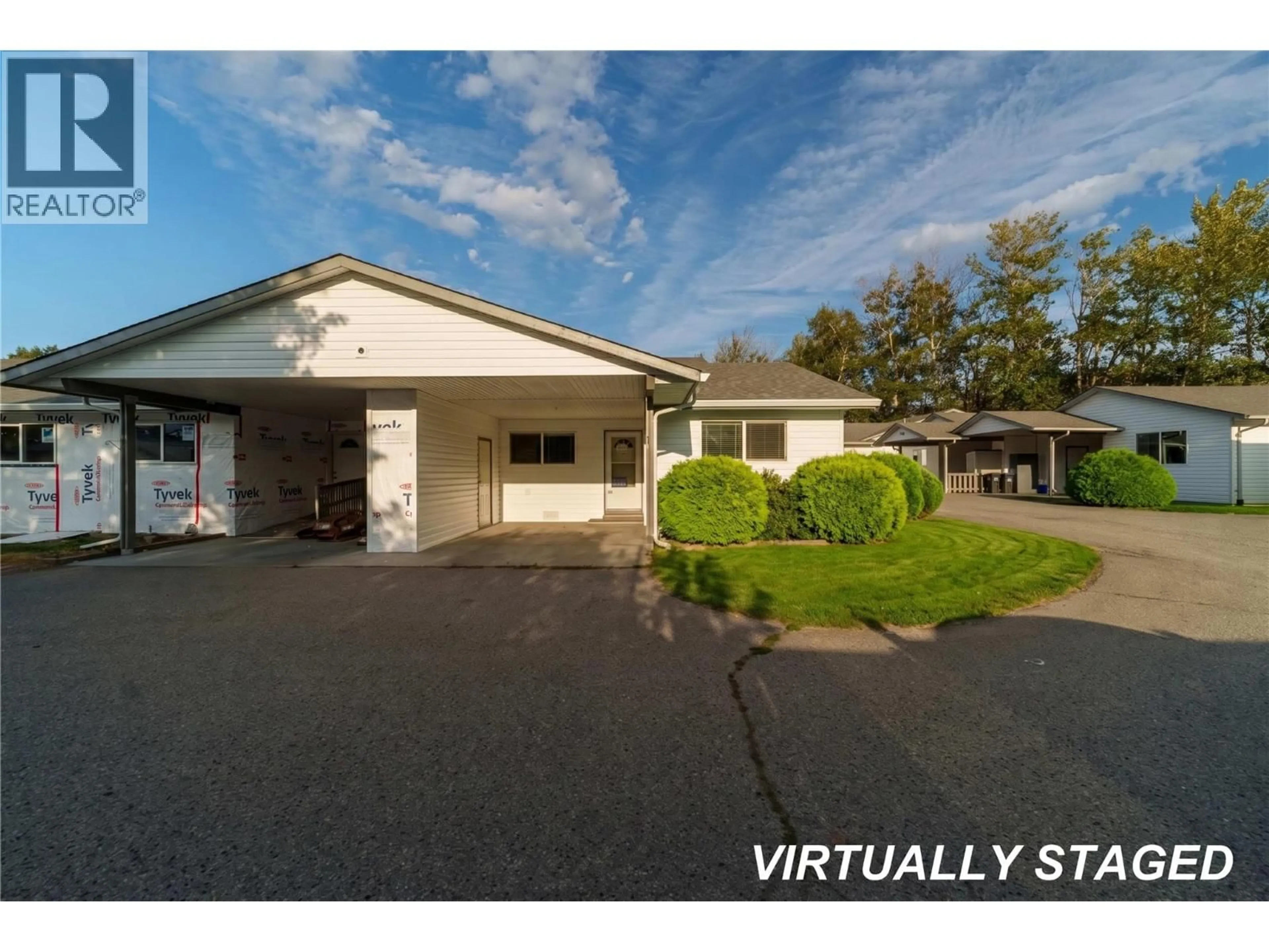 A pic from outside/outdoor area/front of a property/back of a property/a pic from drone, unknown for 106 - 1692 ATKINSON STREET, Penticton British Columbia V2A6B5