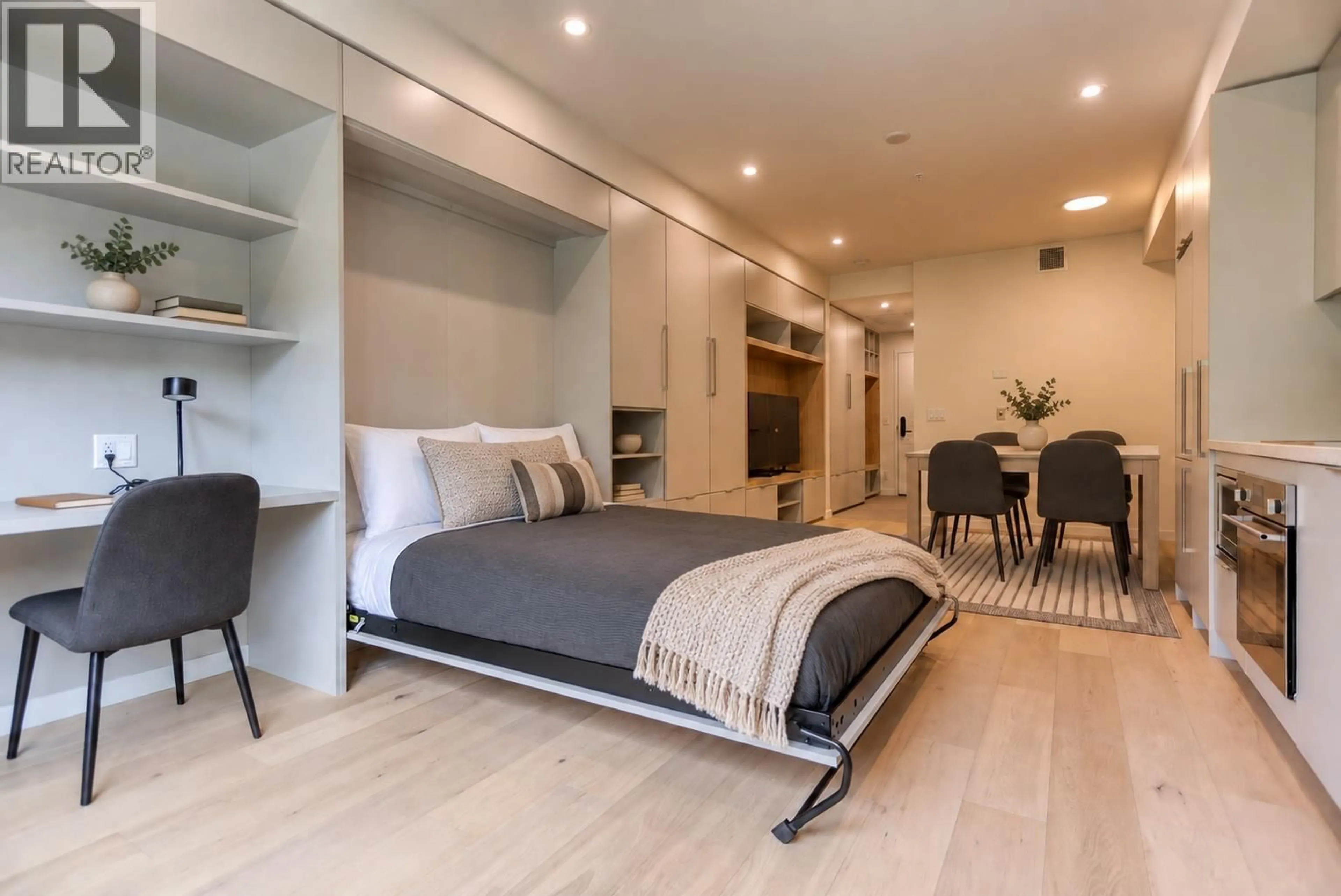 Bedroom with bed, wood/laminate floor for 209 - 4280 RED MOUNTAIN ROAD, Rossland British Columbia V0G1Y0