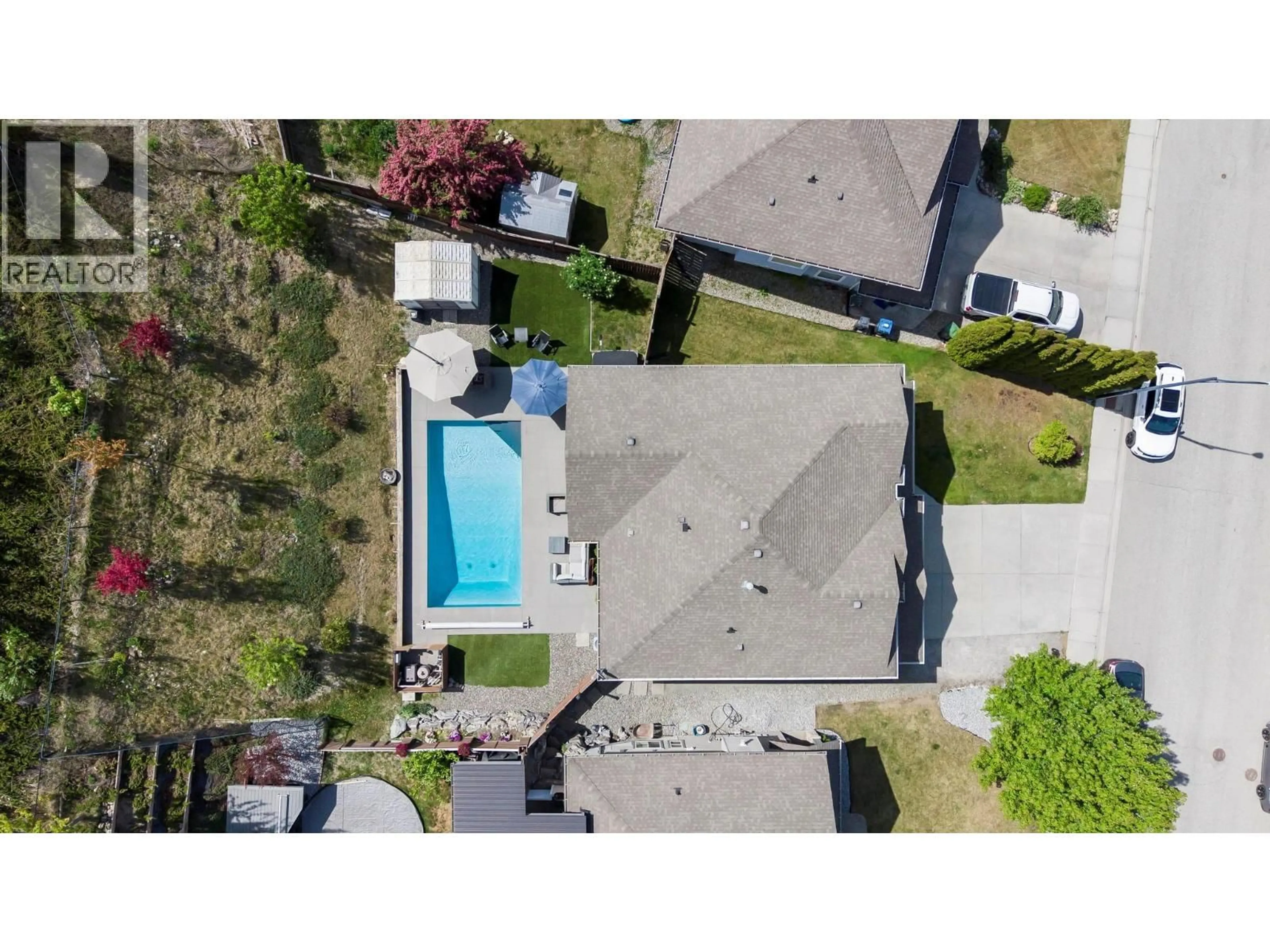 A pic from outside/outdoor area/front of a property/back of a property/a pic from drone, street for 1673 KLOPPENBURG ROAD, Kelowna British Columbia V1P1G2