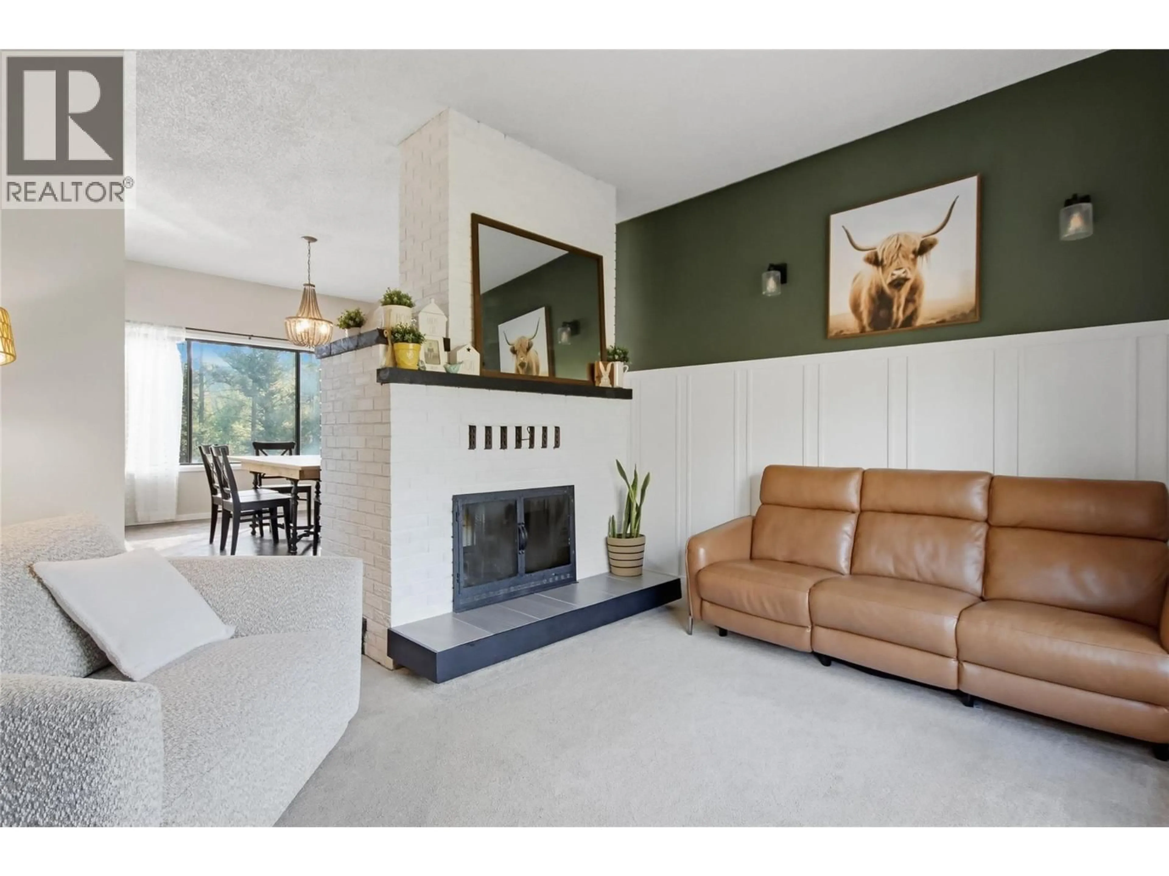 Living room with furniture, ceramic/tile floor for 222 GOWAN DRIVE, Logan Lake British Columbia V0K1W0