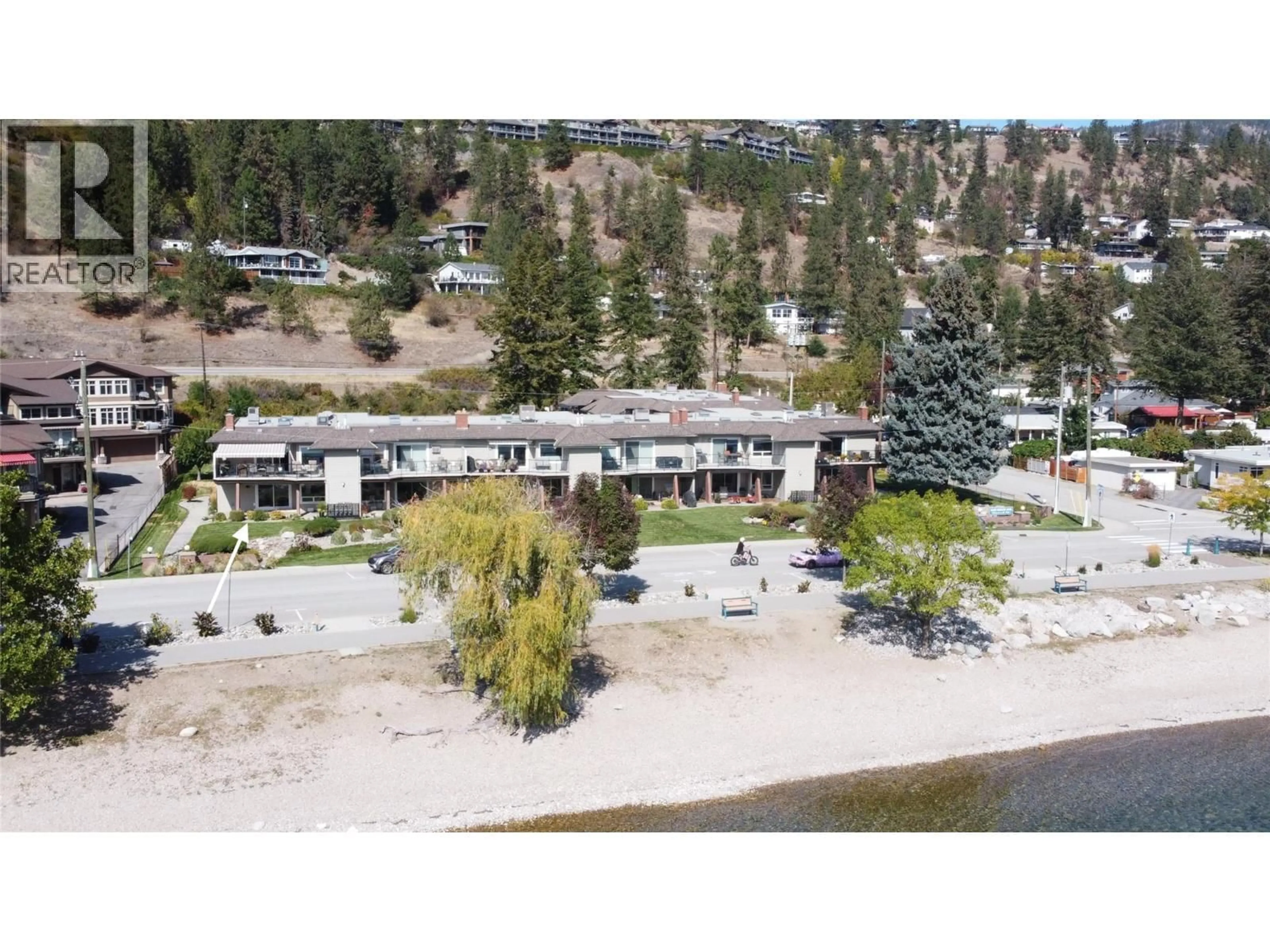A pic from outside/outdoor area/front of a property/back of a property/a pic from drone, water/lake/river/ocean view for 106 - 4340 BEACH AVENUE, Peachland British Columbia V0H1X6