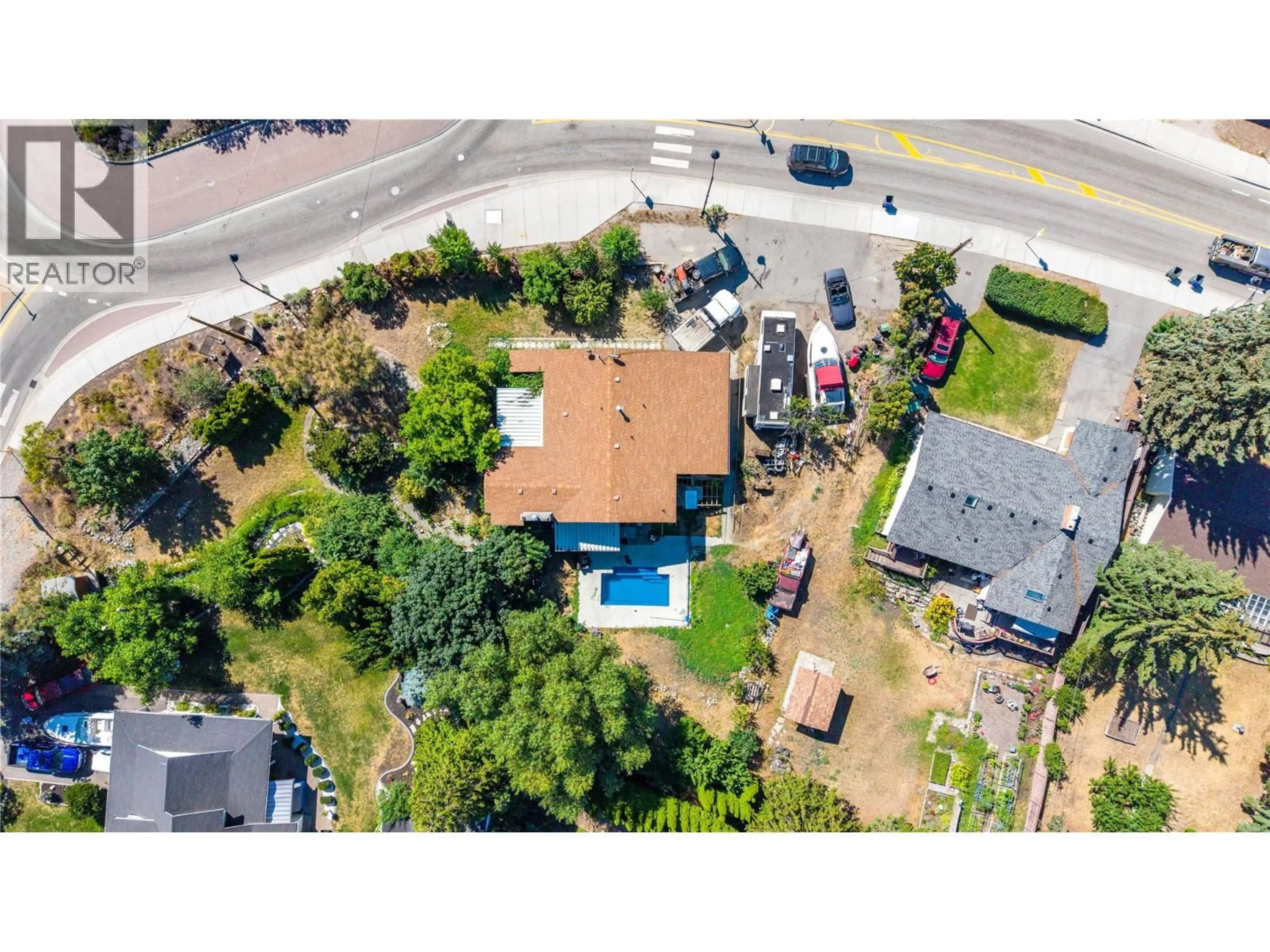 A pic from outside/outdoor area/front of a property/back of a property/a pic from drone, street for 10108 PRAIRIE VALLEY ROAD, Summerland British Columbia V0H1Z0