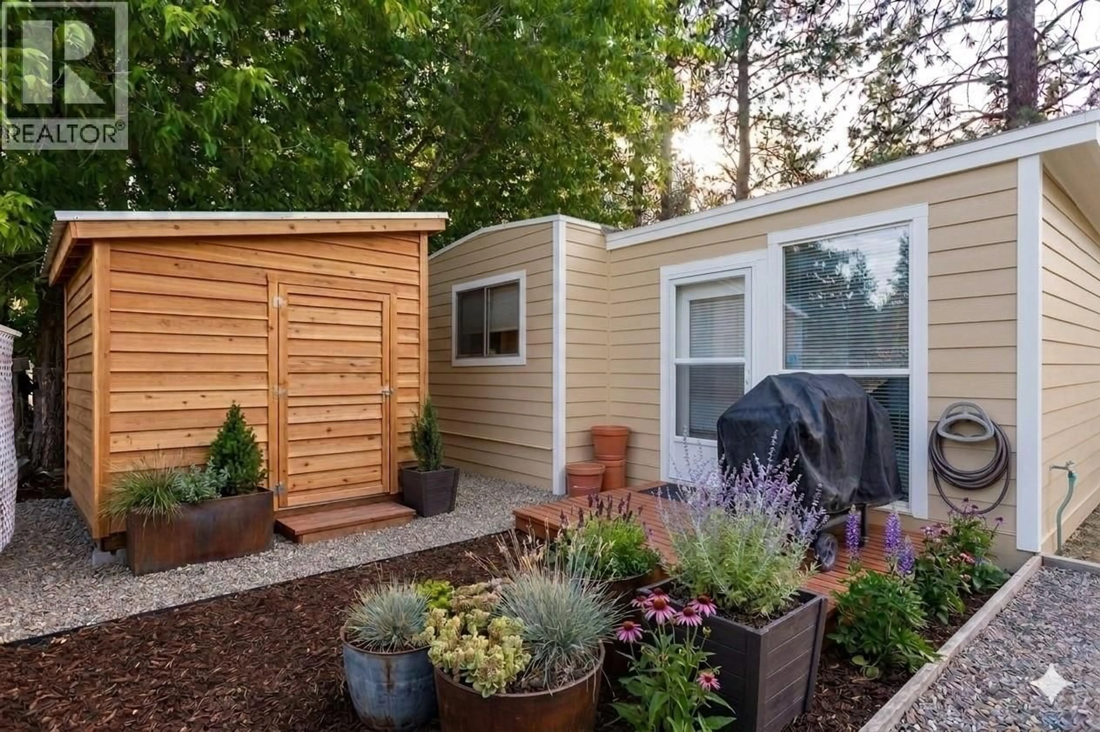 Home with vinyl exterior material, street for 131 - 1999 HIGHWAY 97 OTHER SOUTH, West Kelowna British Columbia V1Z1B2