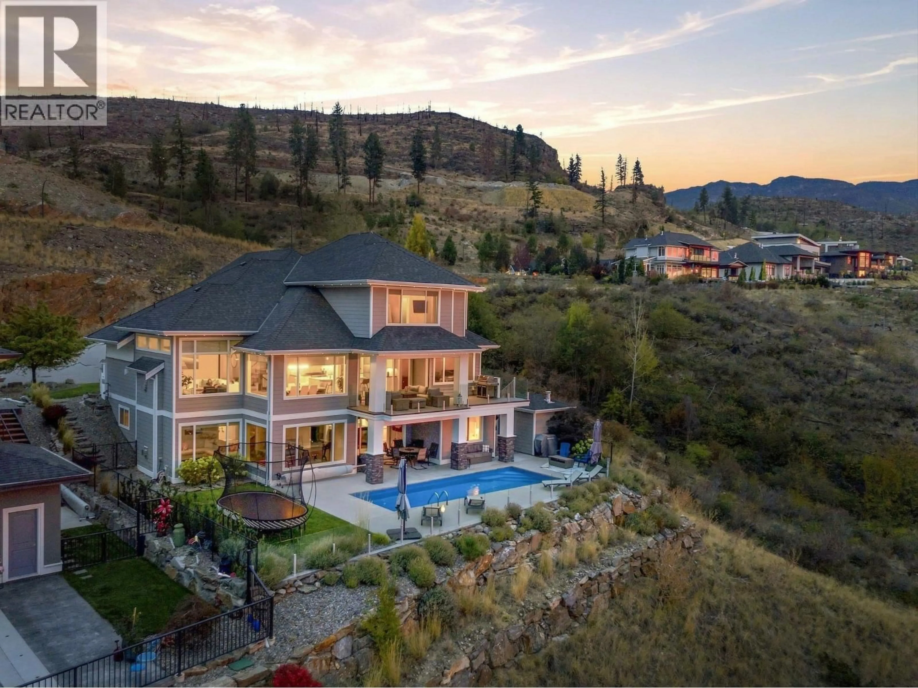 A pic from outside/outdoor area/front of a property/back of a property/a pic from drone, mountain view for 5590 TRESTLE RIDGE COURT, Kelowna British Columbia V1W5M3