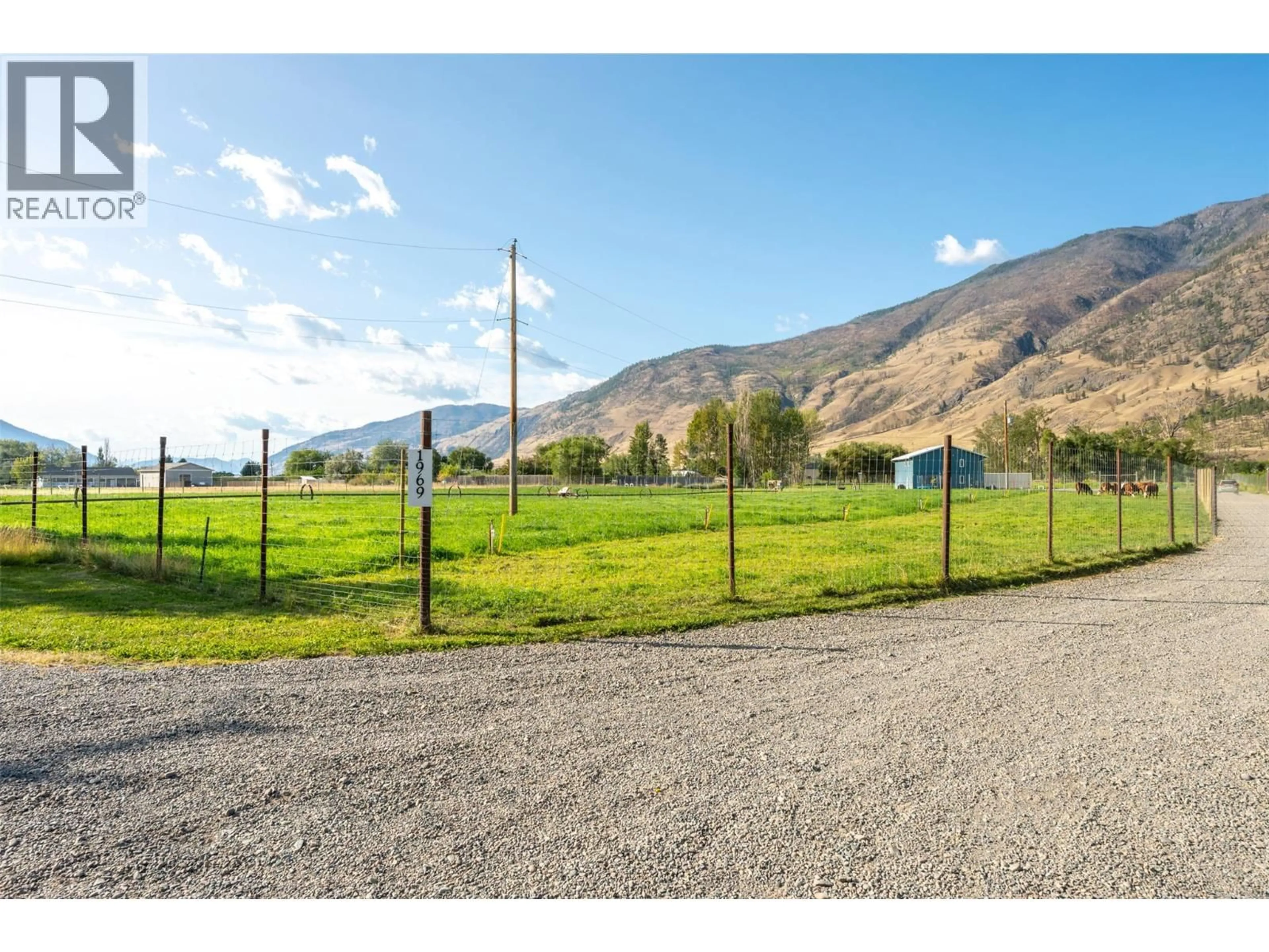 A pic from outside/outdoor area/front of a property/back of a property/a pic from drone, mountain view for 1969 OSPREY LANE, Cawston British Columbia V0X1C1