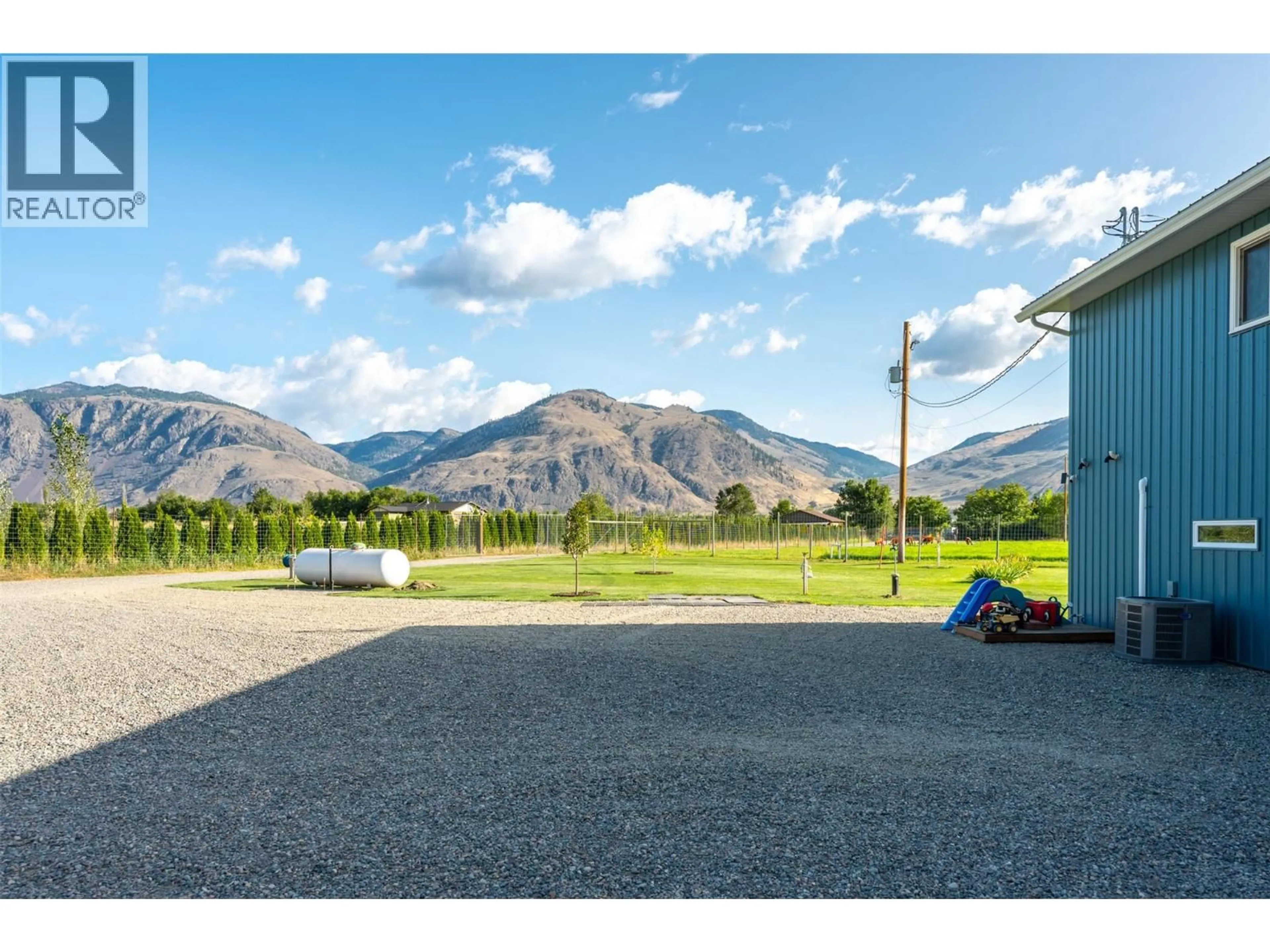 A pic from outside/outdoor area/front of a property/back of a property/a pic from drone, mountain view for 1969 OSPREY LANE, Cawston British Columbia V0X1C1