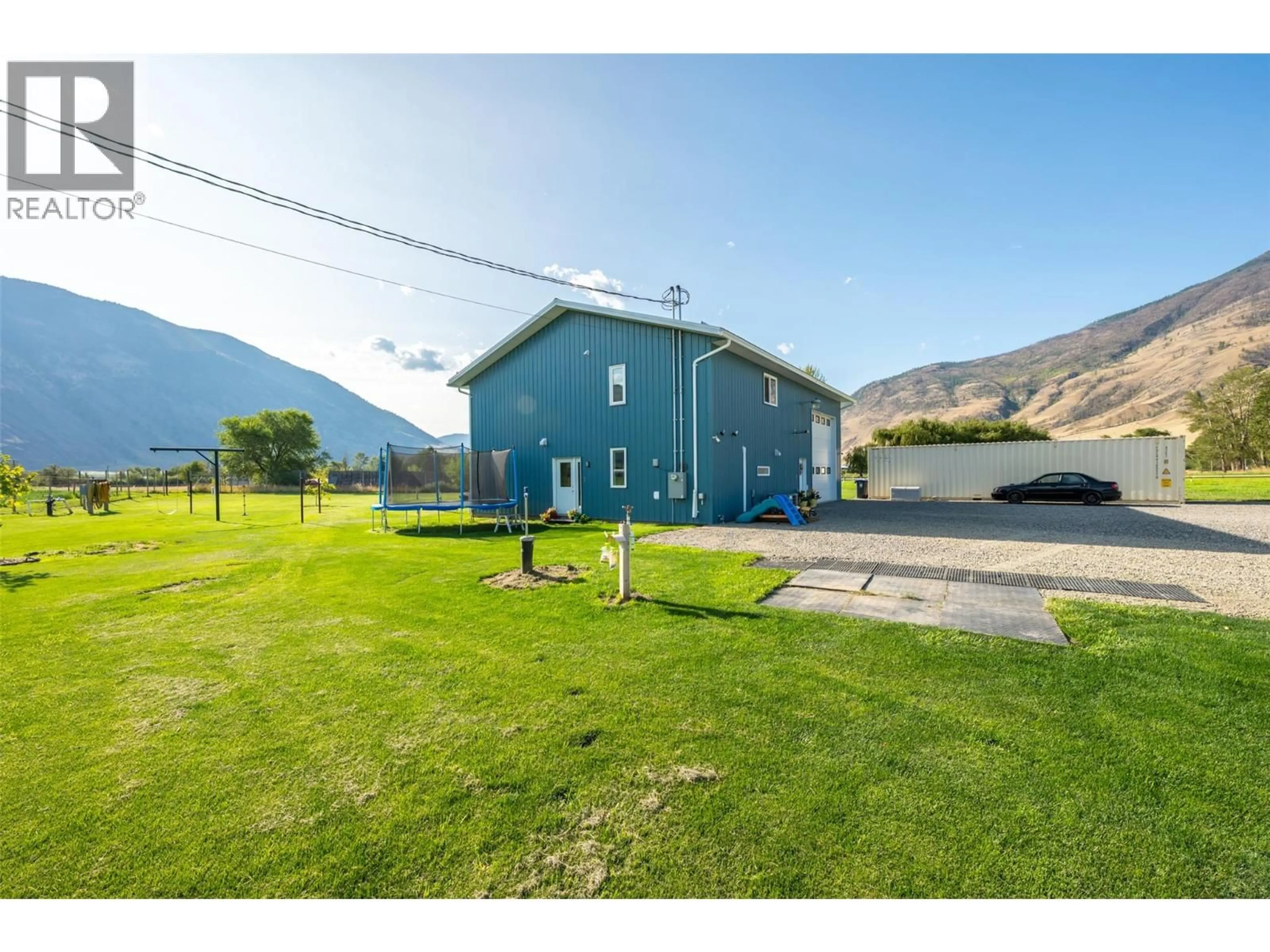A pic from outside/outdoor area/front of a property/back of a property/a pic from drone, mountain view for 1969 OSPREY LANE, Cawston British Columbia V0X1C1