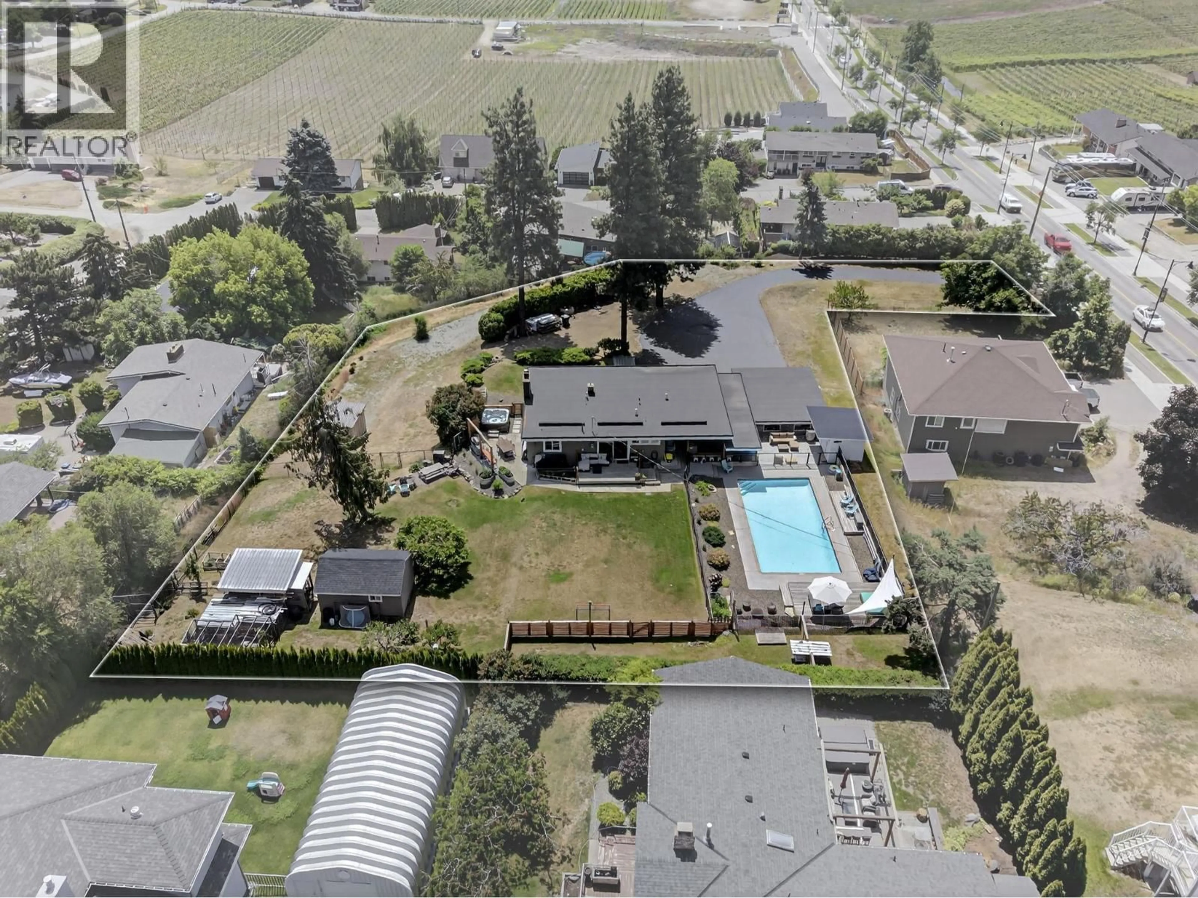 A pic from outside/outdoor area/front of a property/back of a property/a pic from drone, mountain view for 2715 BOUCHERIE ROAD, West Kelowna British Columbia V1Z2G3