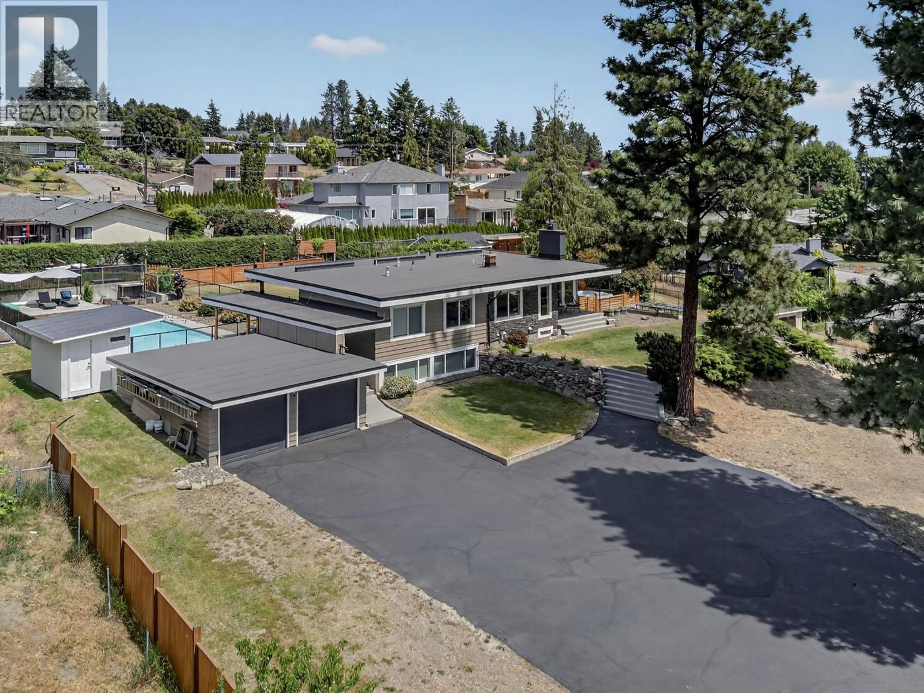 A pic from outside/outdoor area/front of a property/back of a property/a pic from drone, mountain view for 2715 BOUCHERIE ROAD, West Kelowna British Columbia V1Z2G3