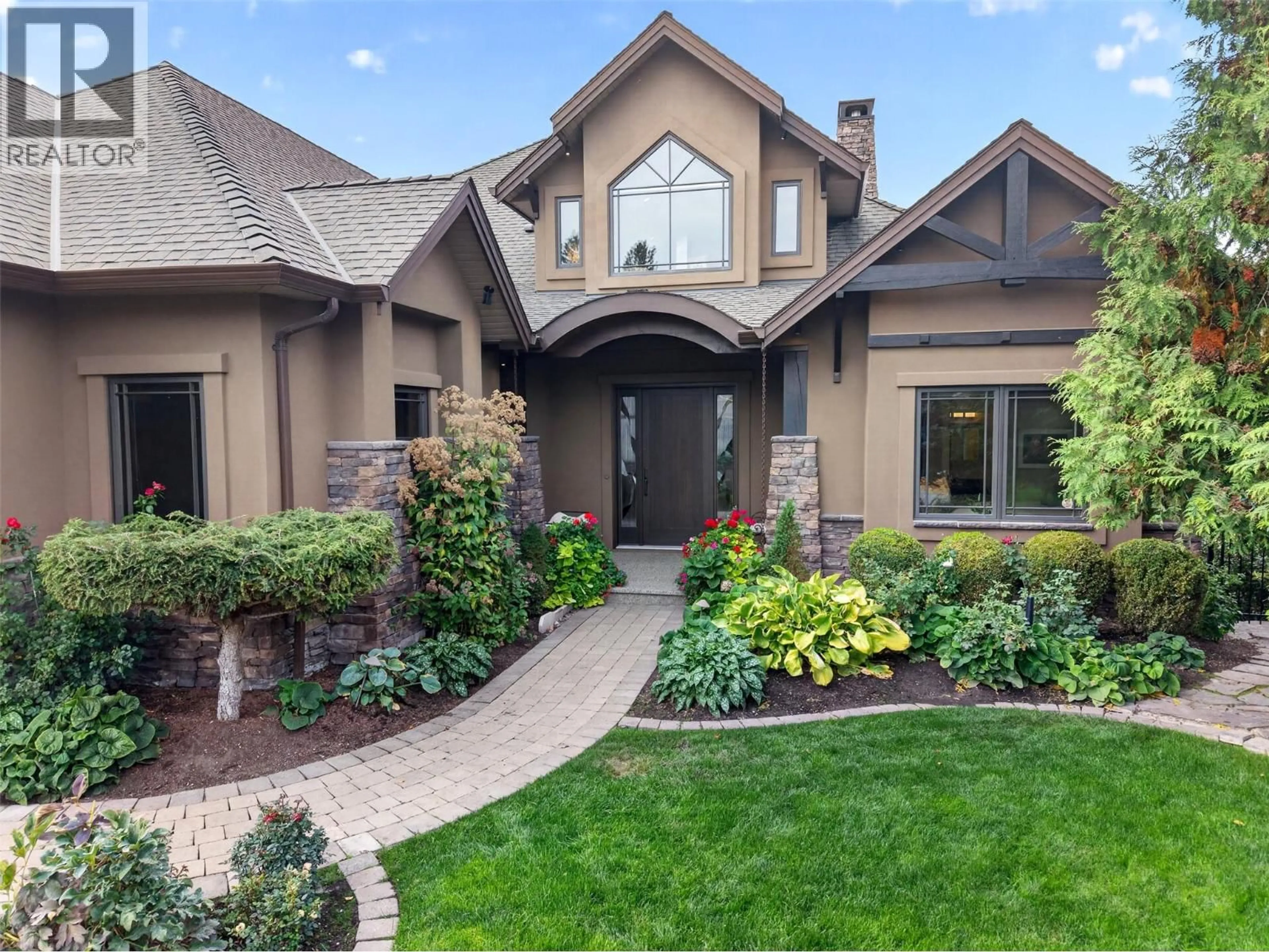 Home with brick exterior material, street for 734 MARIN CRESCENT, Kelowna British Columbia V1W5C8