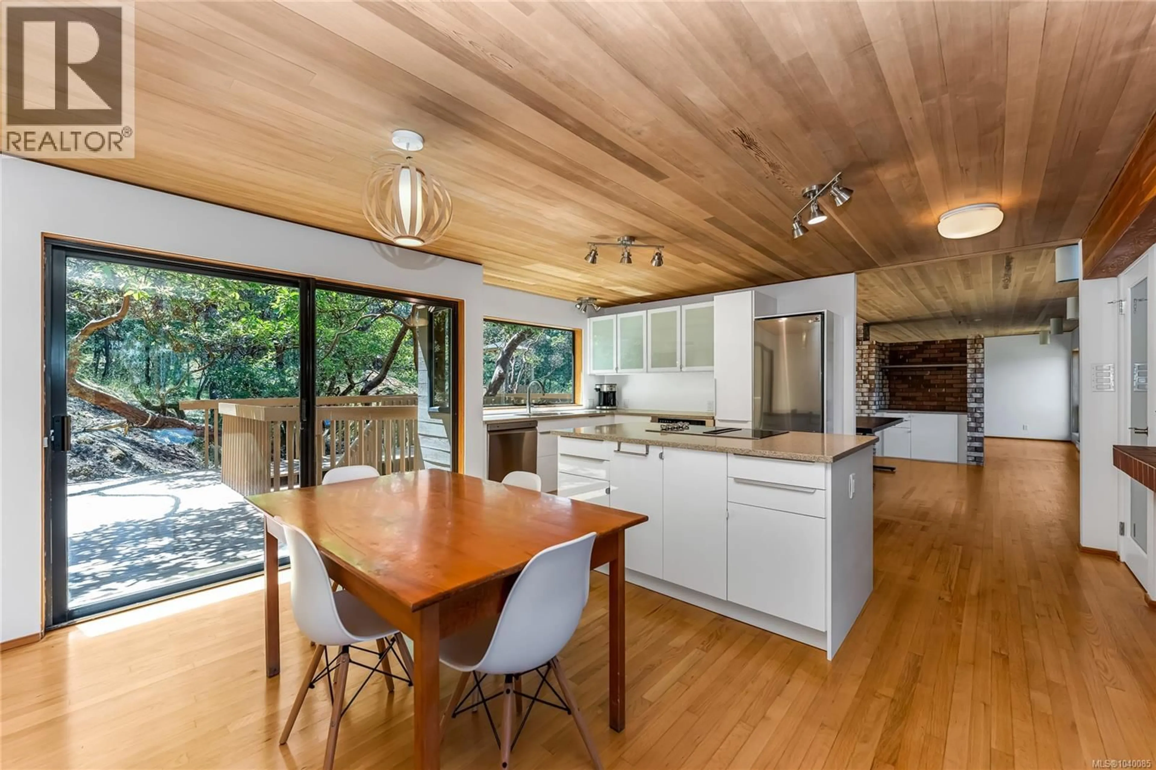 Open concept kitchen, wood/laminate floor for 260 MOSS HILL PLACE, Metchosin British Columbia V9C3Z2