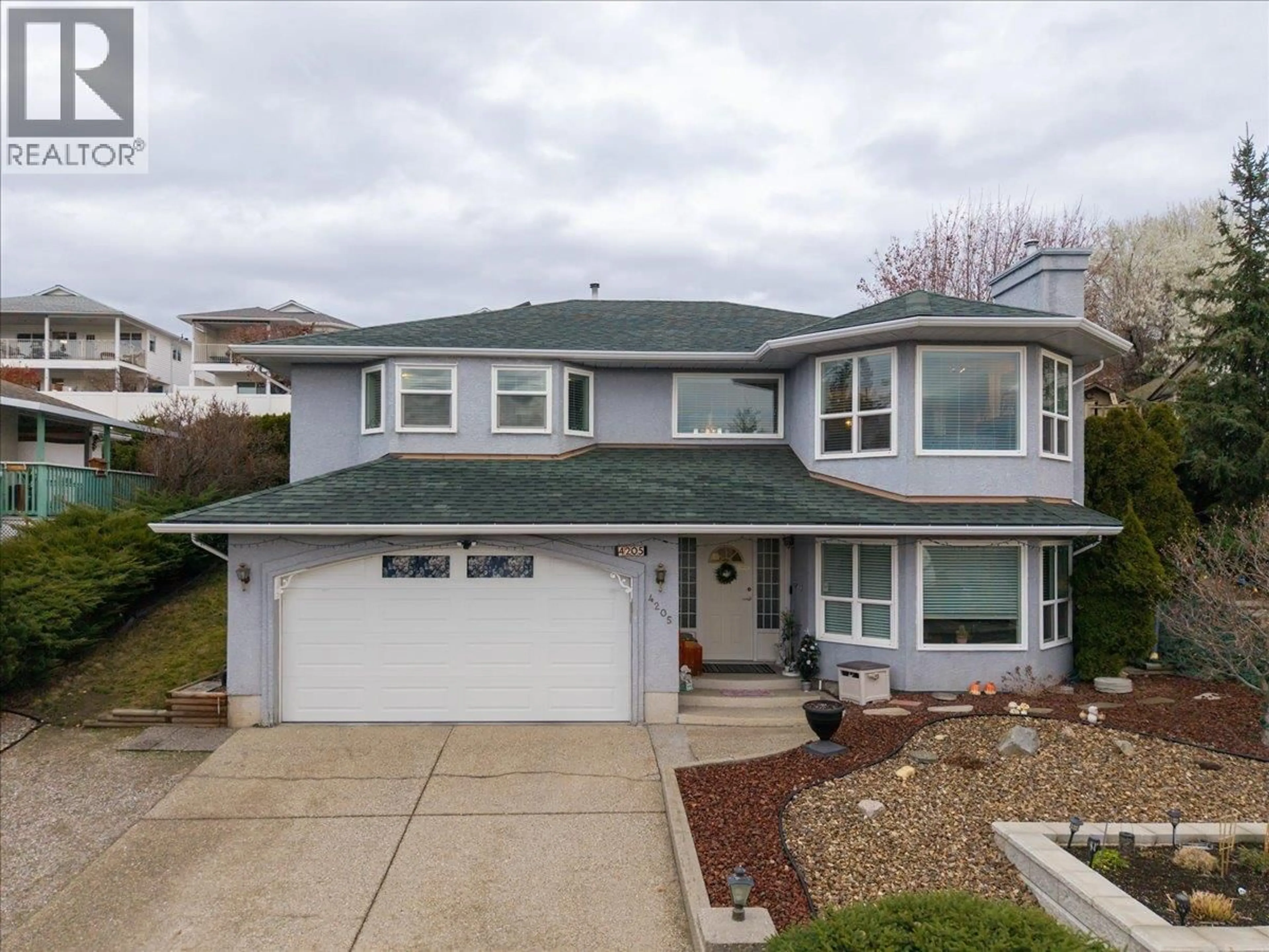 Home with vinyl exterior material, street for 4205 WELLINGTON DRIVE, Vernon British Columbia V1T9H7