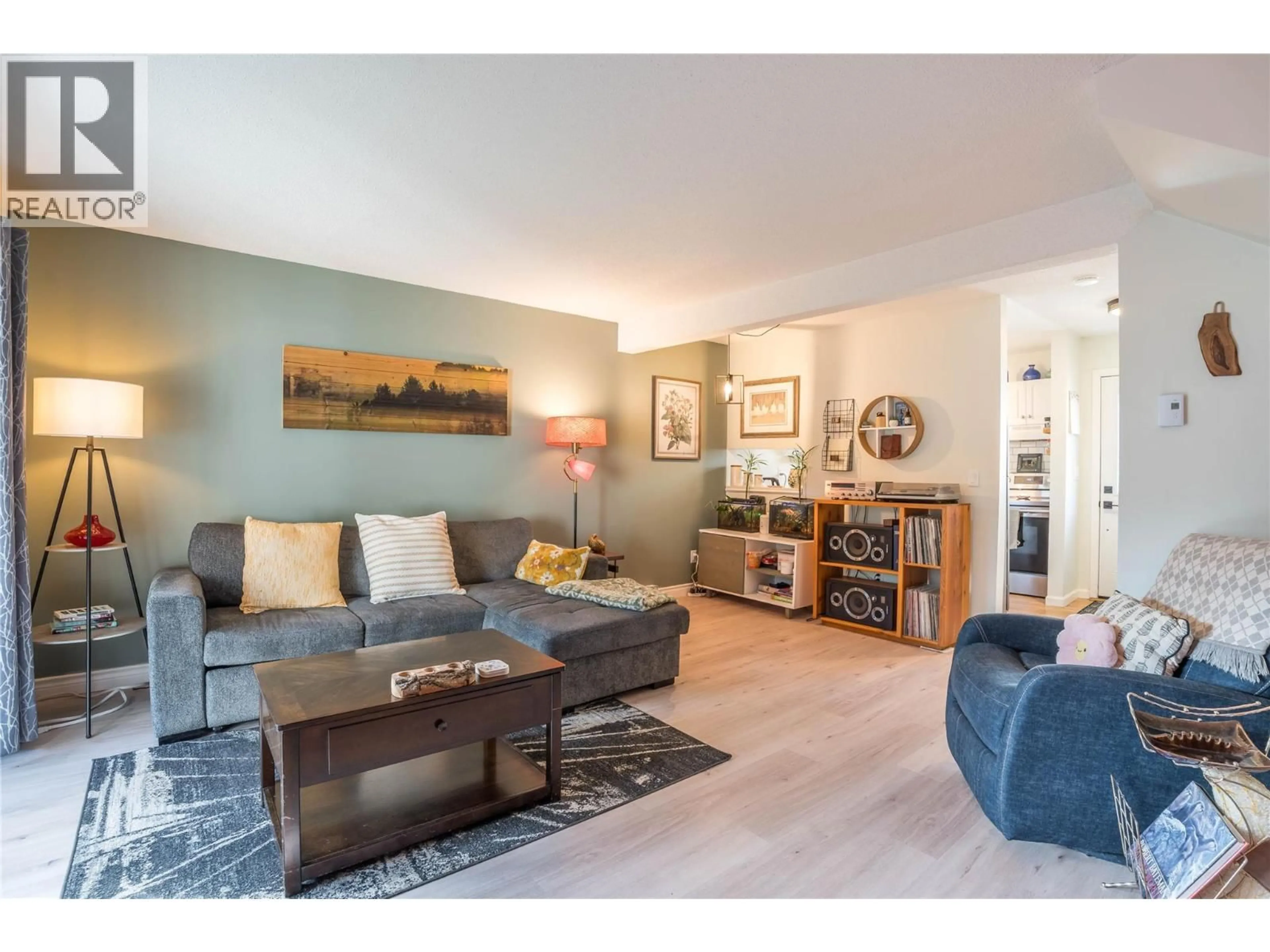 Living room with furniture, wood/laminate floor for 5 - 2250 BASKIN STREET, Penticton British Columbia V2A6Y3