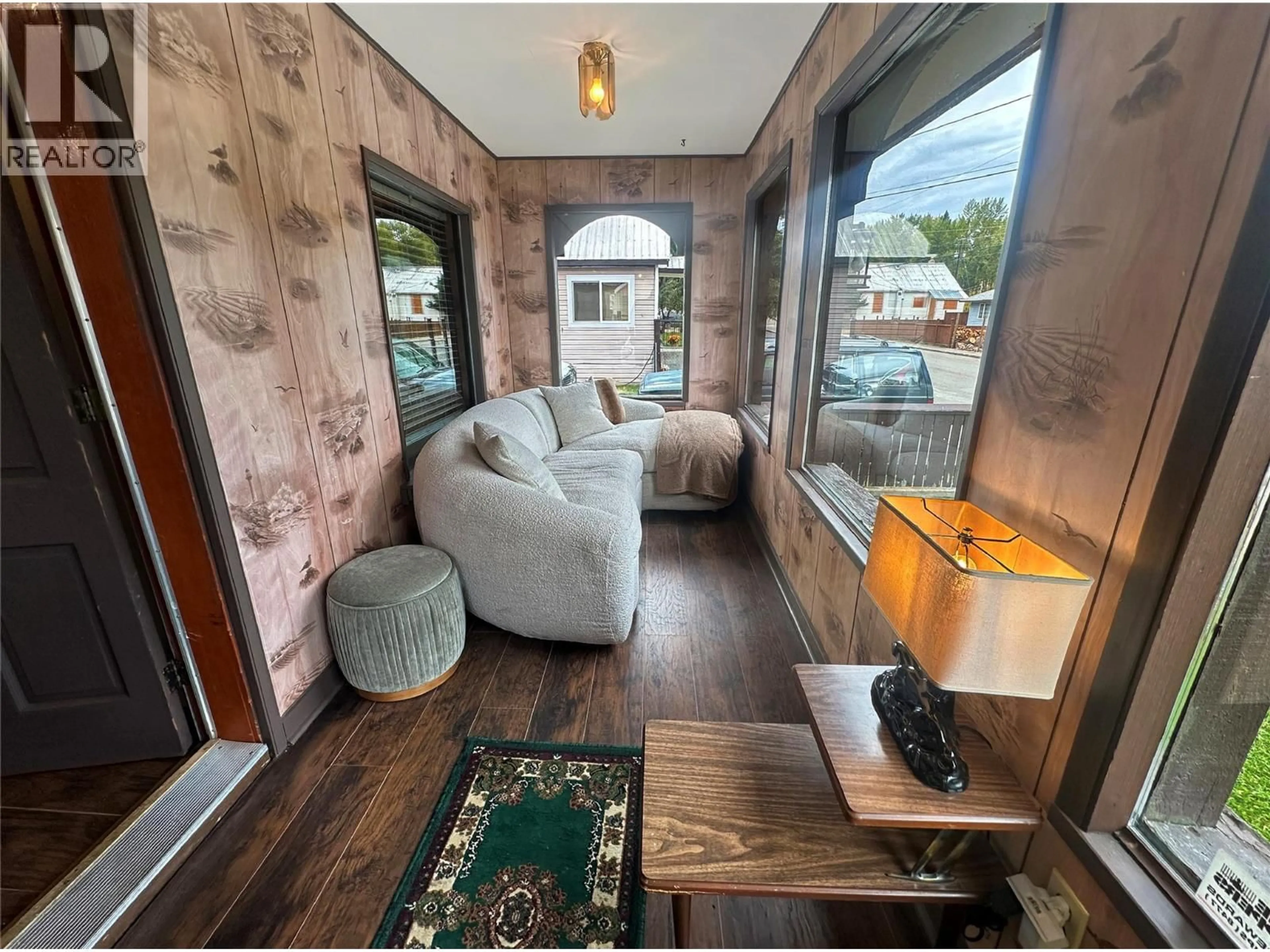 Living room with furniture, wood/laminate floor for 396 BURTON AVENUE, Princeton British Columbia V0X1W0