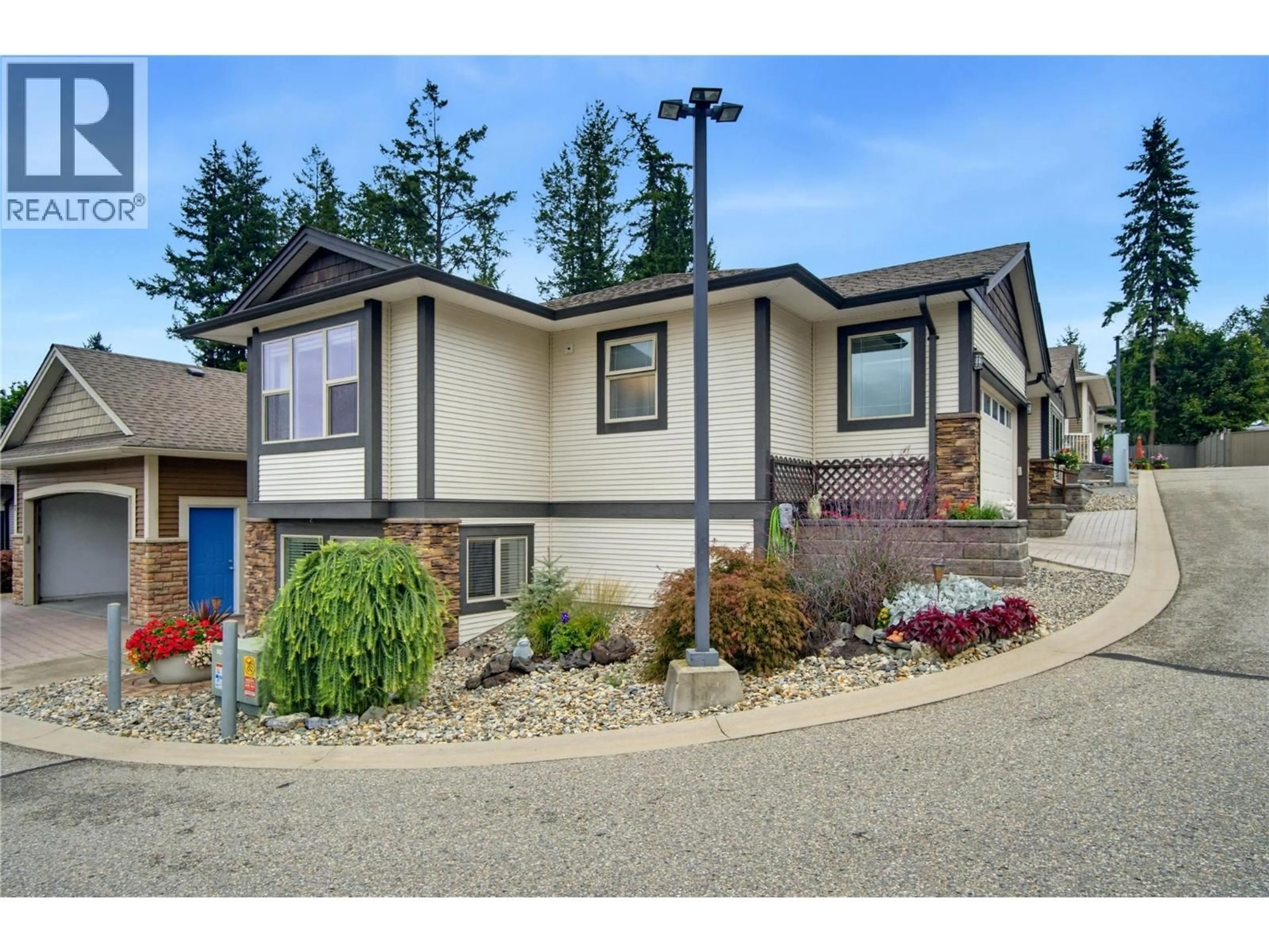 Home with vinyl exterior material, street for 8 - 2850 7TH AVENUE NORTHEAST, Salmon Arm British Columbia V1E0B7