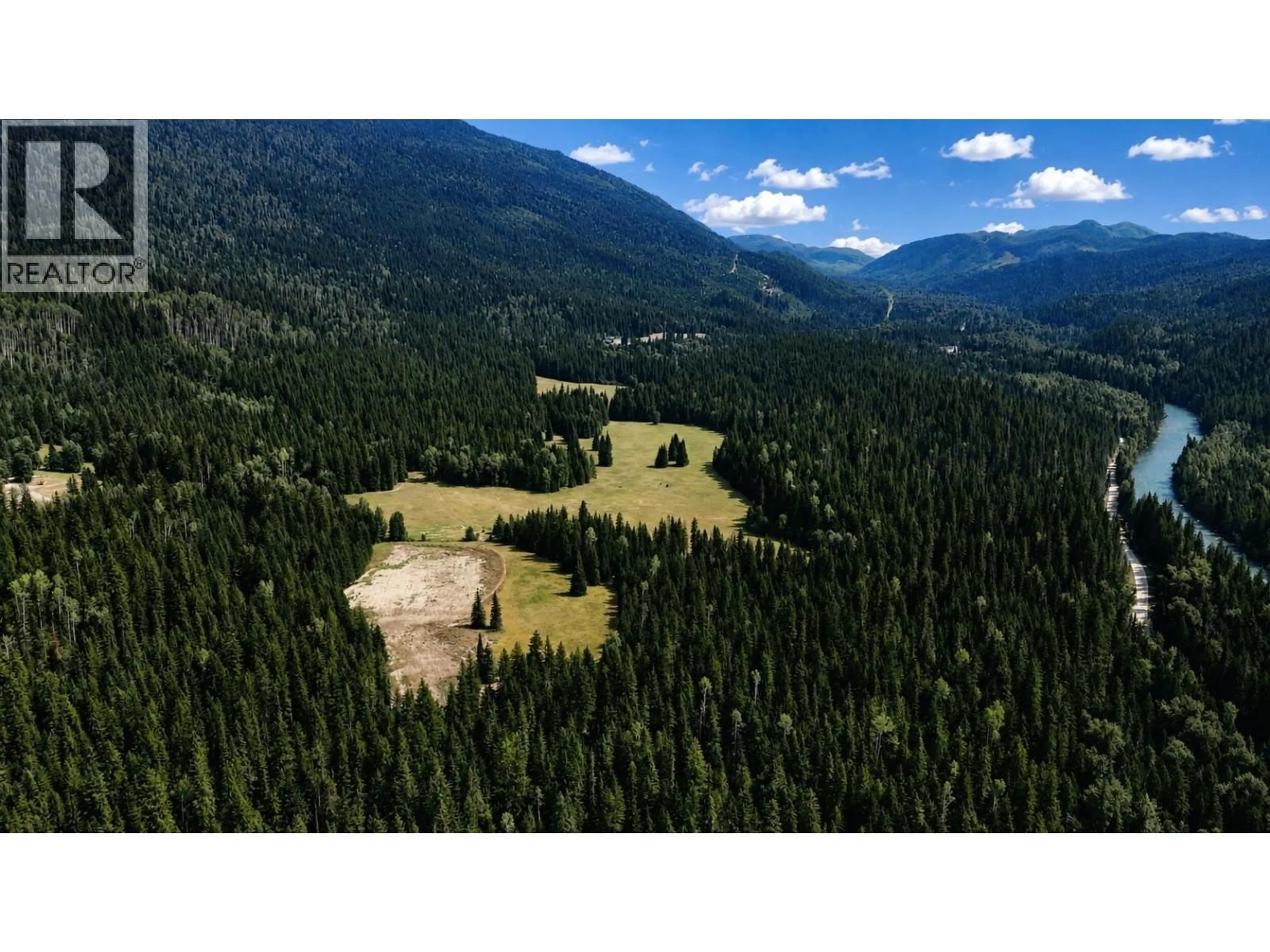 A pic from outside/outdoor area/front of a property/back of a property/a pic from drone, forest/trees view for 15370 HIGHWAY 31 HIGHWAY, Poplar Creek British Columbia V0G1N0