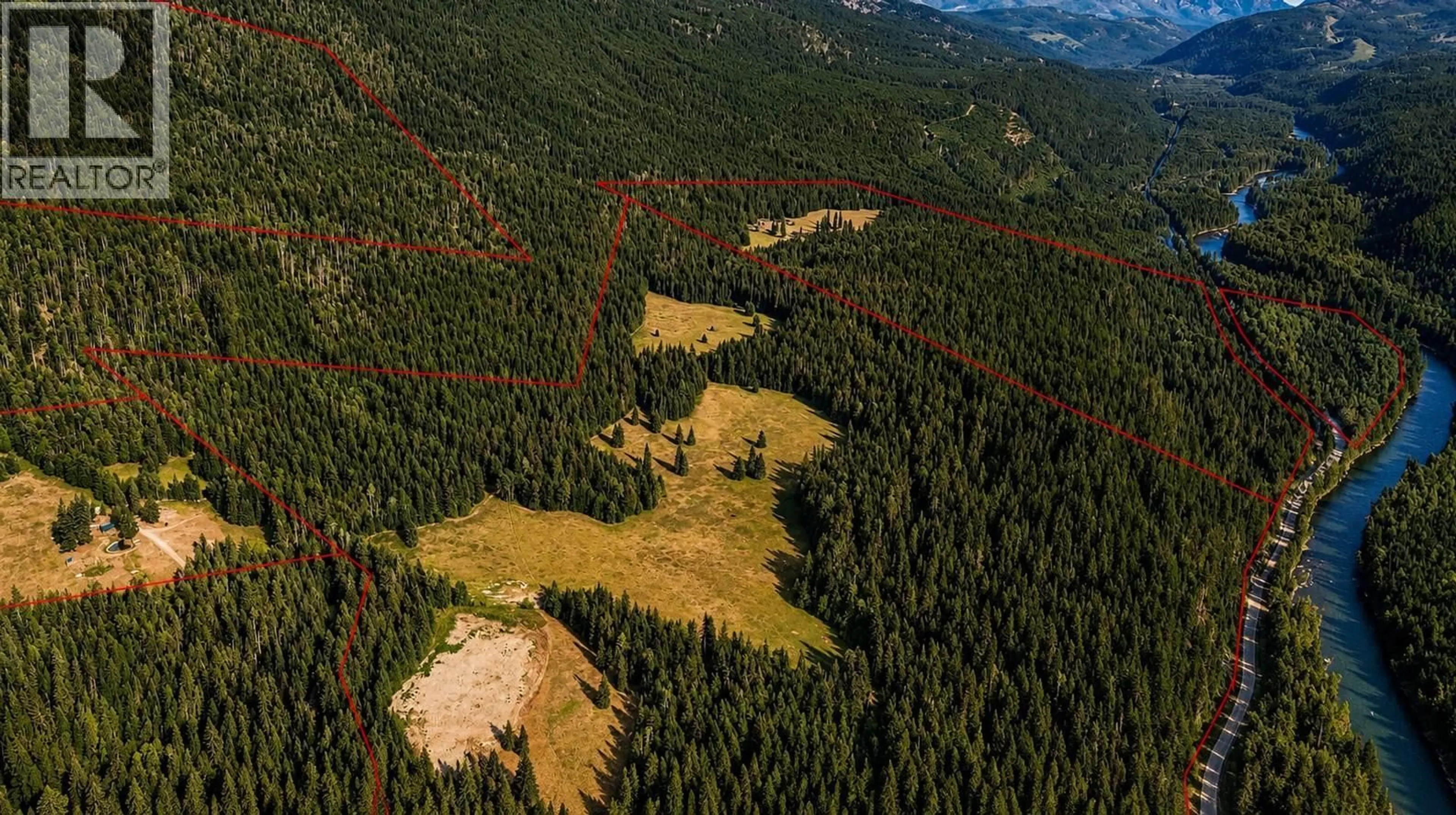 A pic from outside/outdoor area/front of a property/back of a property/a pic from drone, forest/trees view for 15370 HIGHWAY 31 HIGHWAY, Poplar Creek British Columbia V0G1N0