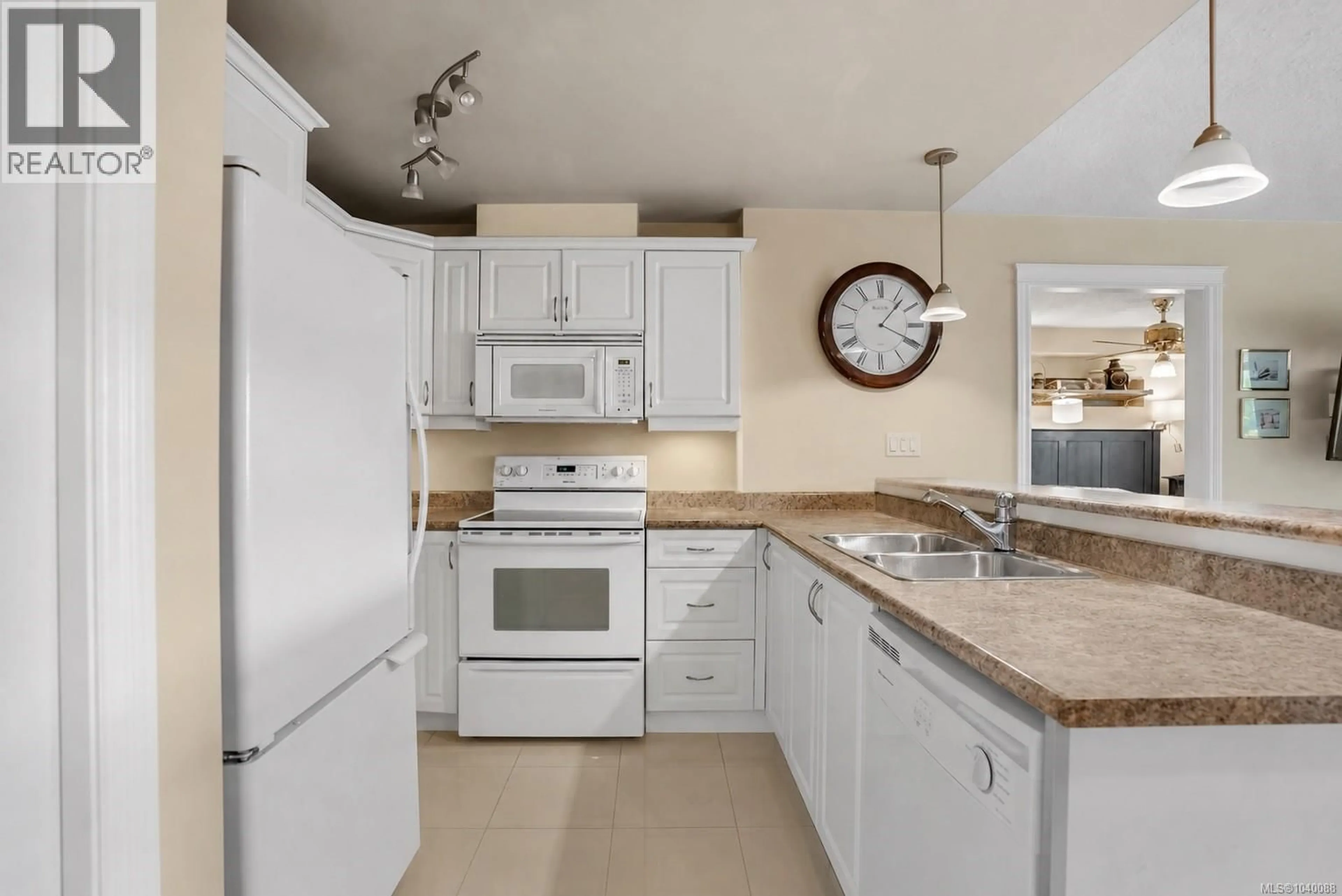 Standard kitchen, ceramic/tile floor for 204 - 4536 VIEWMONT AVENUE, Saanich British Columbia V8Z5L2