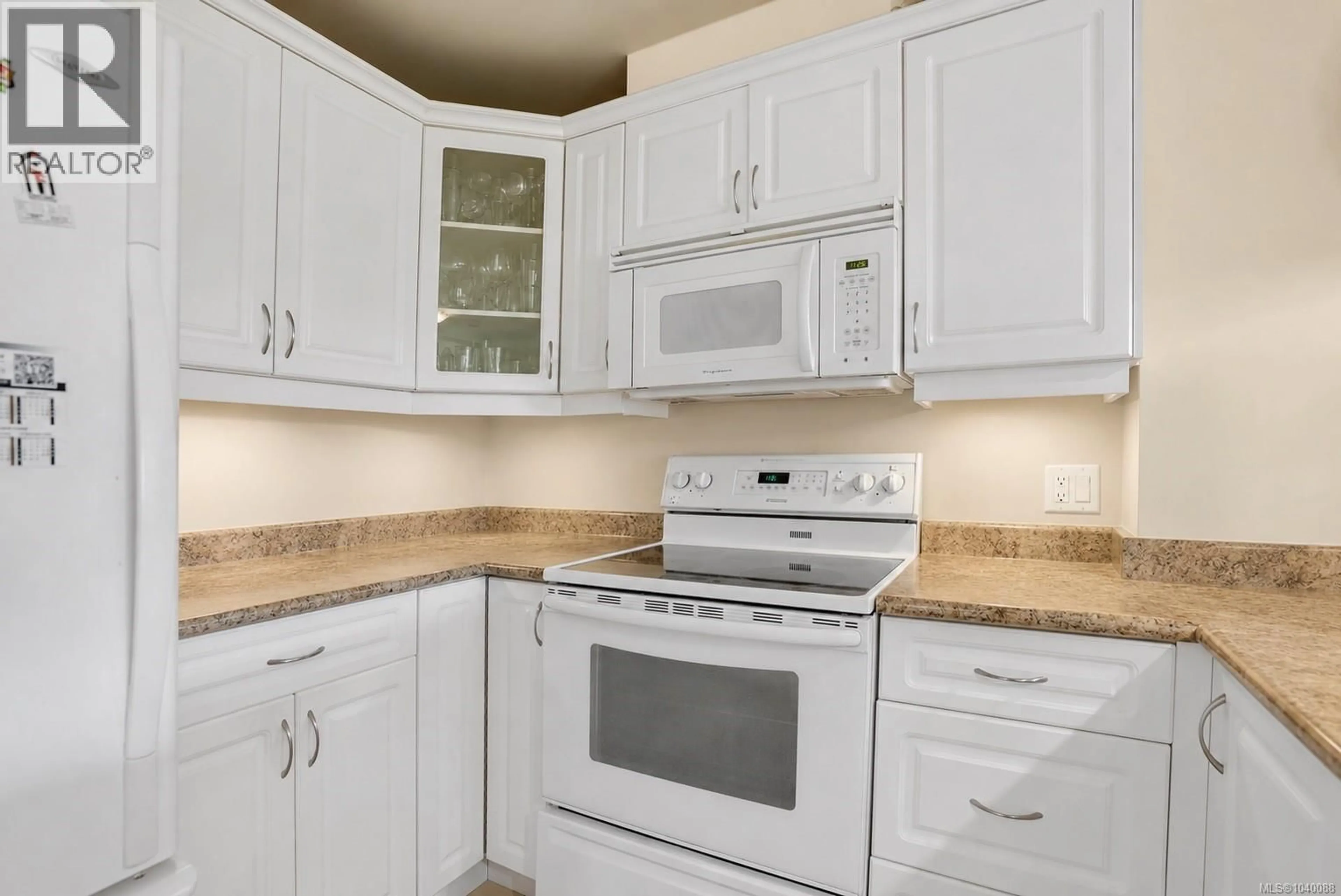 Standard kitchen, ceramic/tile floor for 204 - 4536 VIEWMONT AVENUE, Saanich British Columbia V8Z5L2