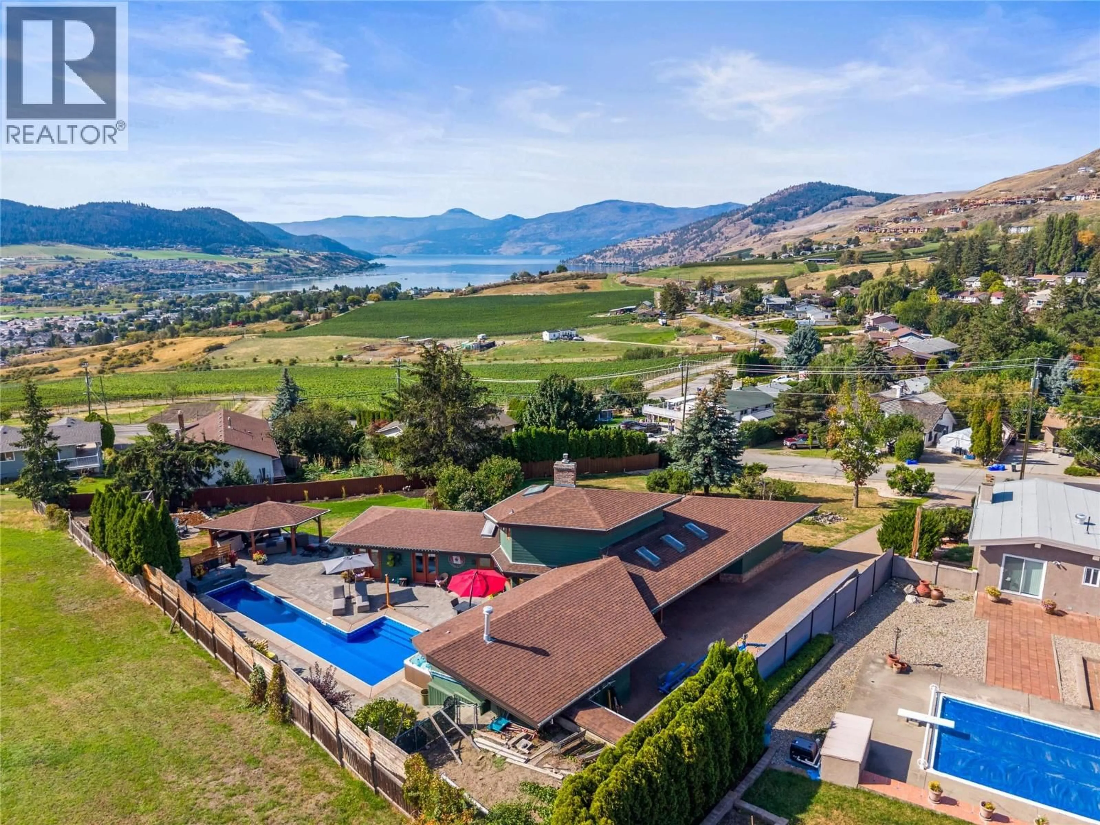A pic from outside/outdoor area/front of a property/back of a property/a pic from drone, water/lake/river/ocean view for 3047 SUNNYVIEW ROAD, Vernon British Columbia V1H1B5