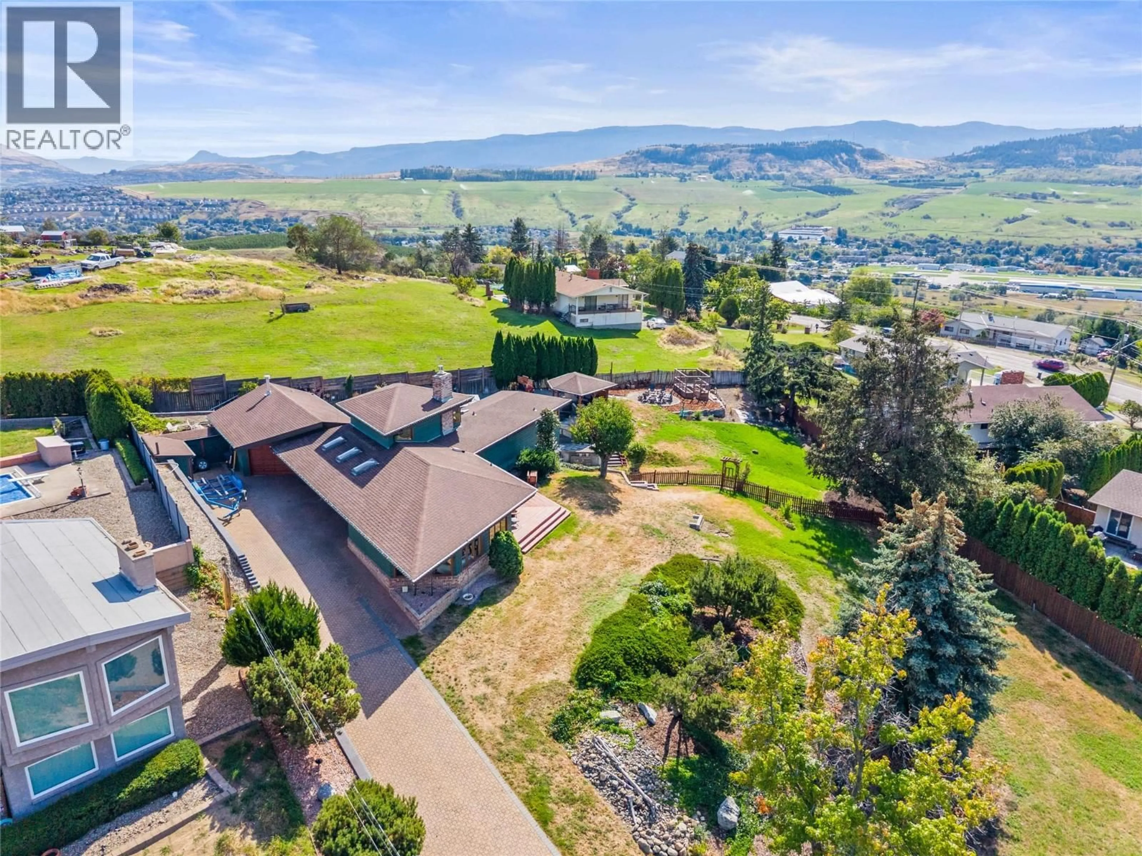 A pic from outside/outdoor area/front of a property/back of a property/a pic from drone, mountain view for 3047 SUNNYVIEW ROAD, Vernon British Columbia V1H1B5