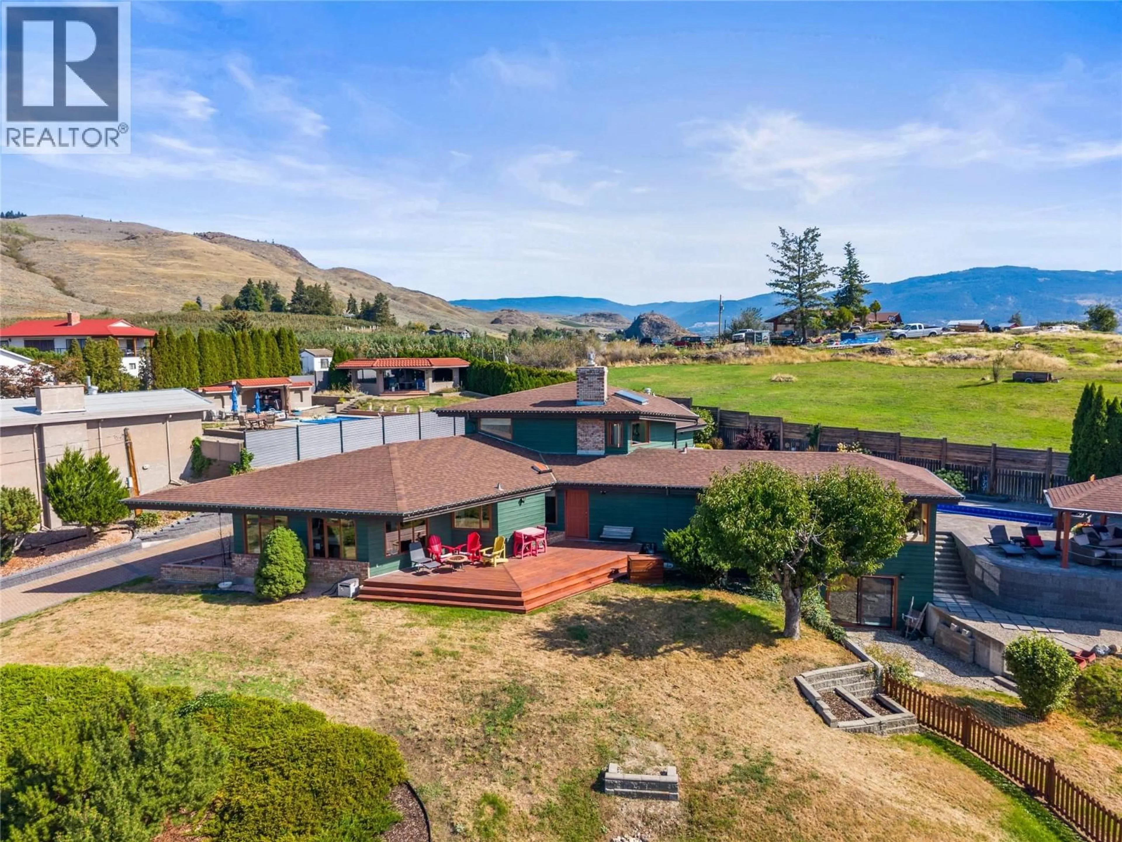 A pic from outside/outdoor area/front of a property/back of a property/a pic from drone, mountain view for 3047 SUNNYVIEW ROAD, Vernon British Columbia V1H1B5