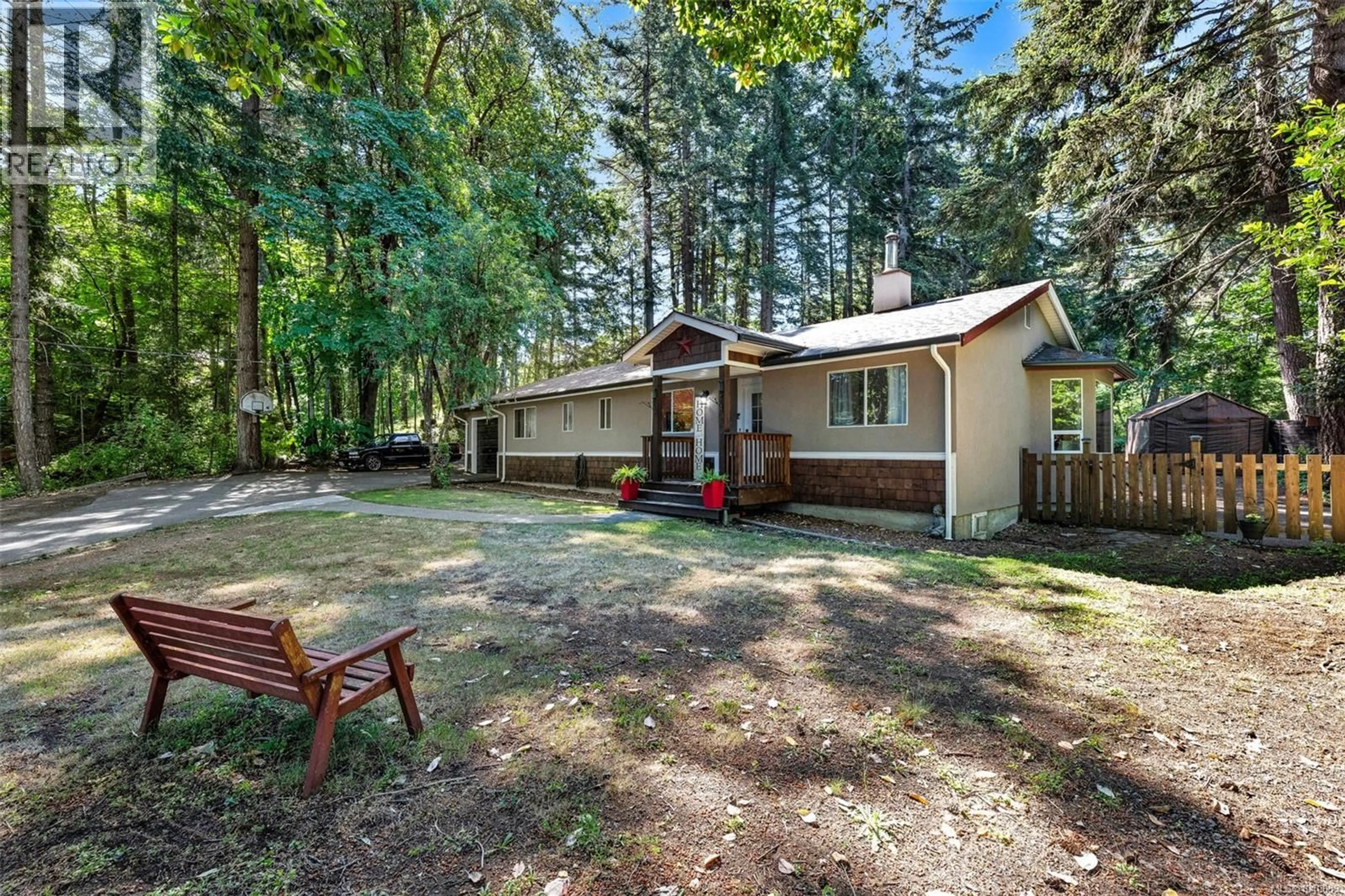 A pic from outside/outdoor area/front of a property/back of a property/a pic from drone, forest/trees view for 1290 MCKENZIE DRIVE, Duncan British Columbia V9L5R9
