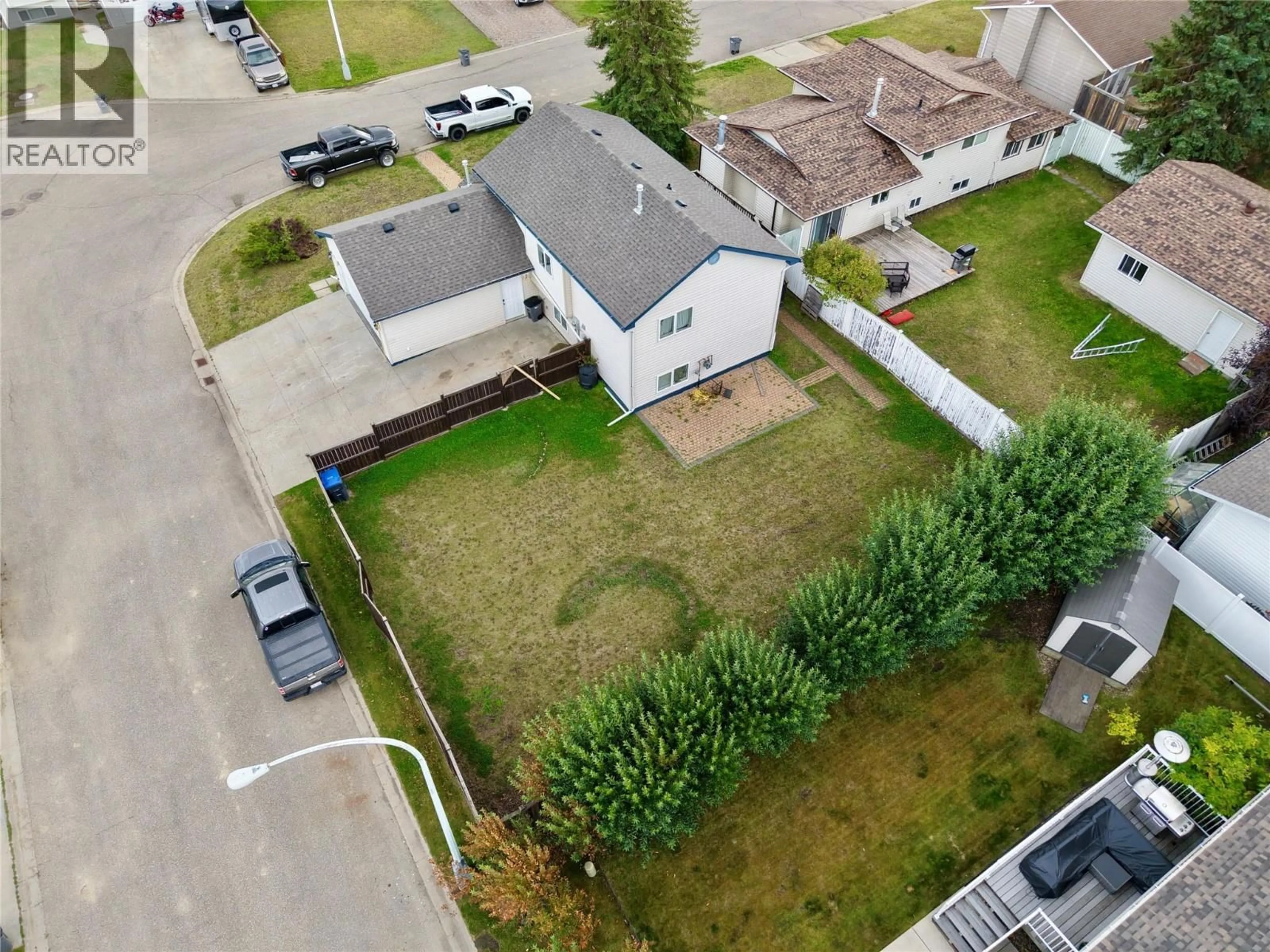 A pic from outside/outdoor area/front of a property/back of a property/a pic from drone, street for 10717 CYPRUS COURT, Dawson Creek British Columbia V1G4N1