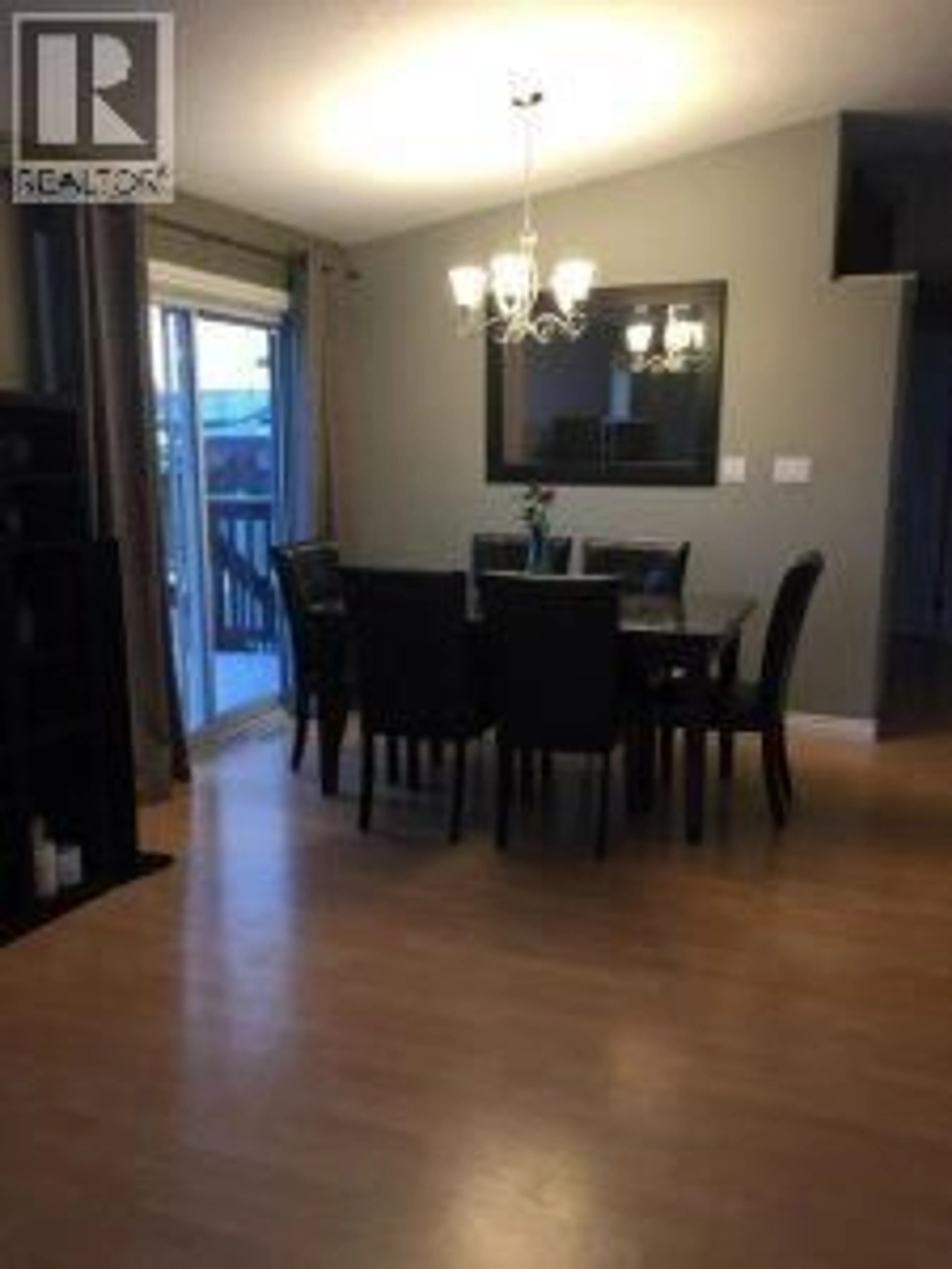 Dining room, wood/laminate floor for 10717 CYPRUS COURT, Dawson Creek British Columbia V1G4N1