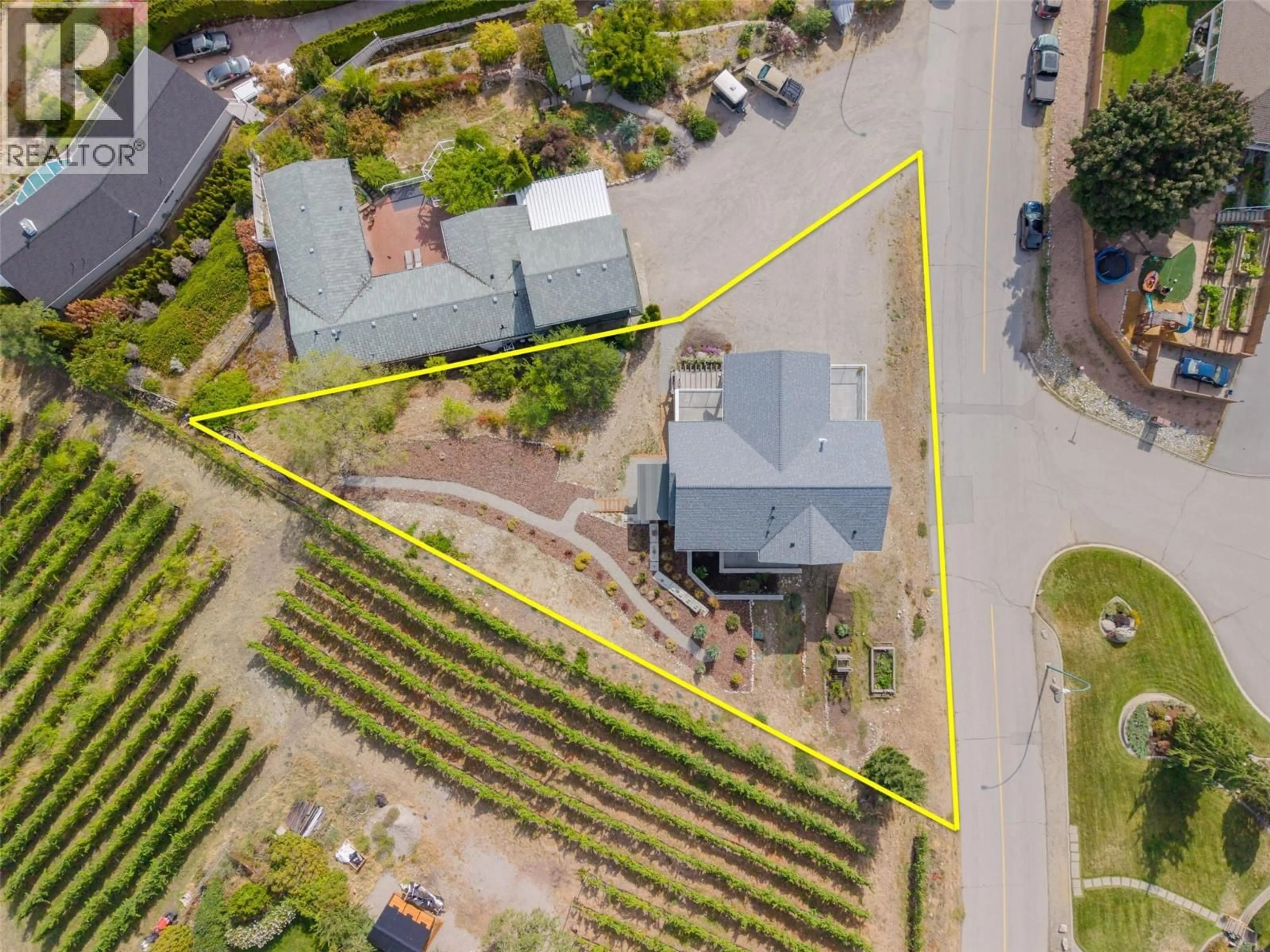 A pic from outside/outdoor area/front of a property/back of a property/a pic from drone, street for 5880 HESPELER ROAD, Summerland British Columbia V0H1Z4