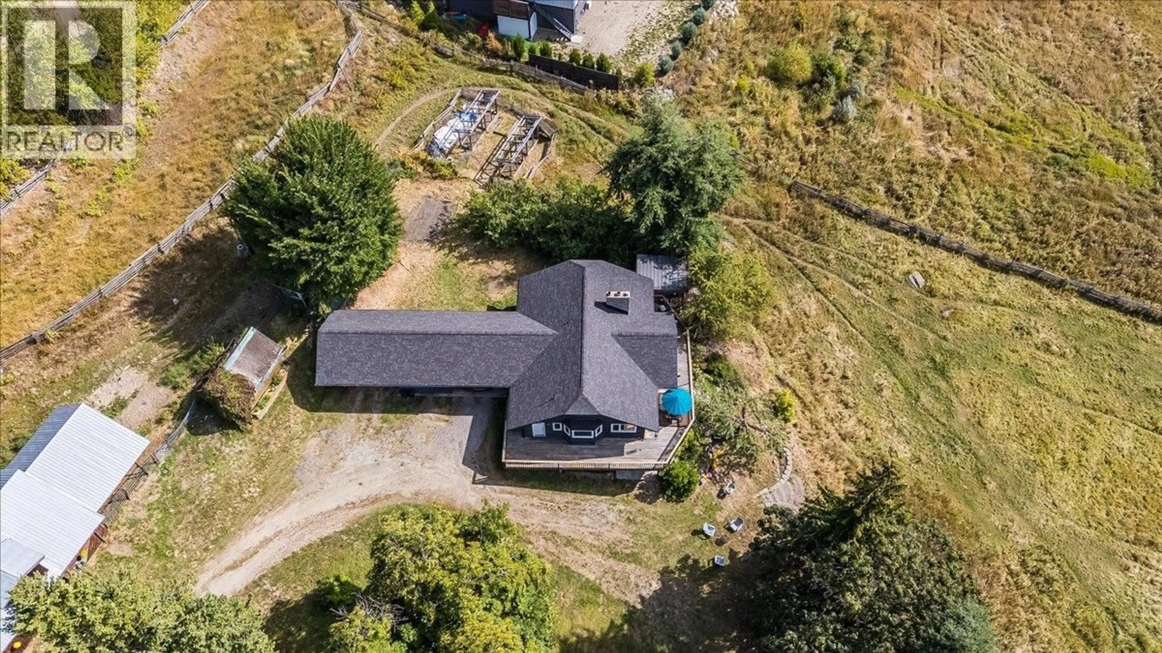 A pic from outside/outdoor area/front of a property/back of a property/a pic from drone, unknown for 2961 HAPPY VALLEY ROAD, Rossland British Columbia V0G1Y0