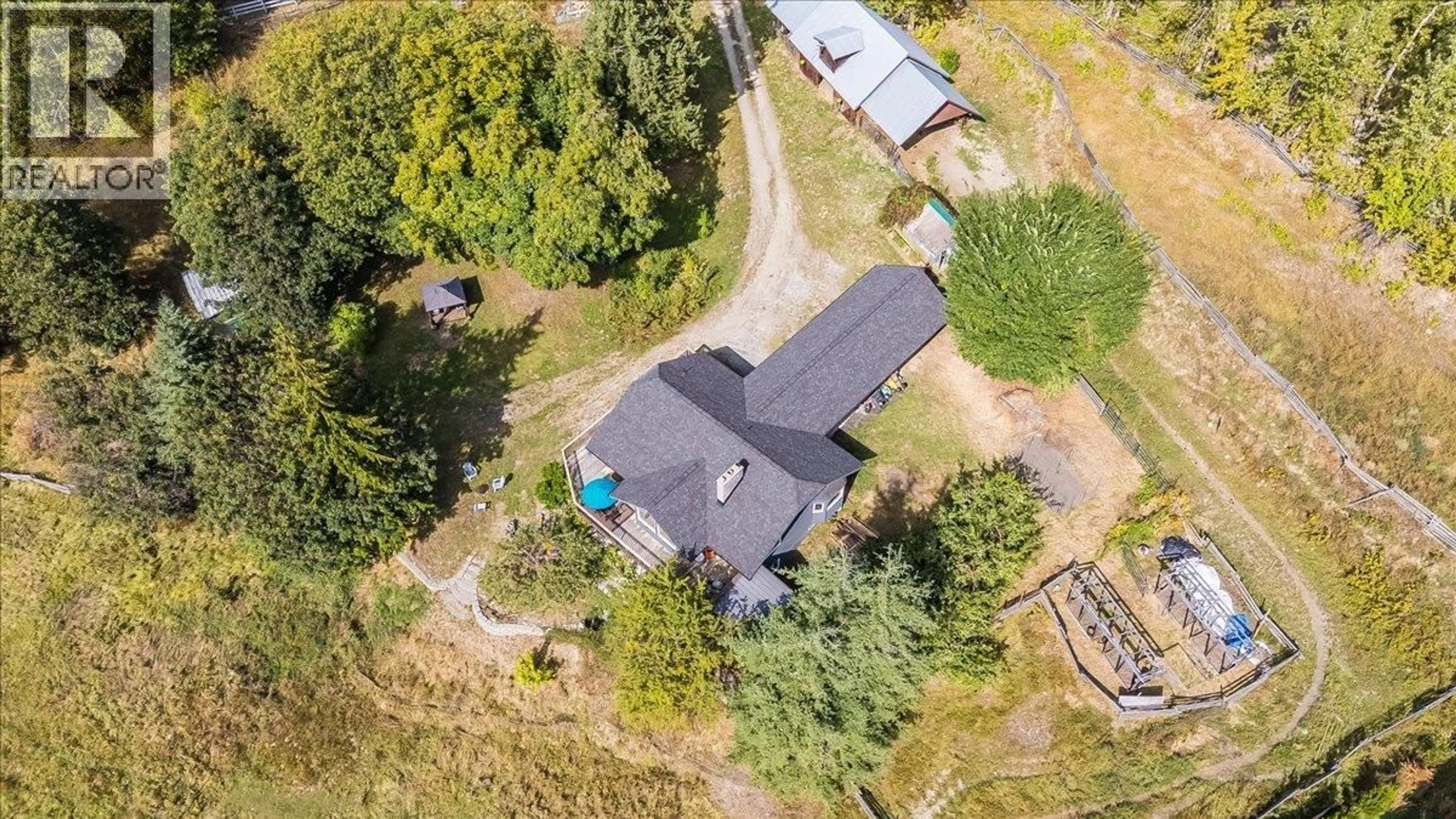 A pic from outside/outdoor area/front of a property/back of a property/a pic from drone, unknown for 2961 HAPPY VALLEY ROAD, Rossland British Columbia V0G1Y0