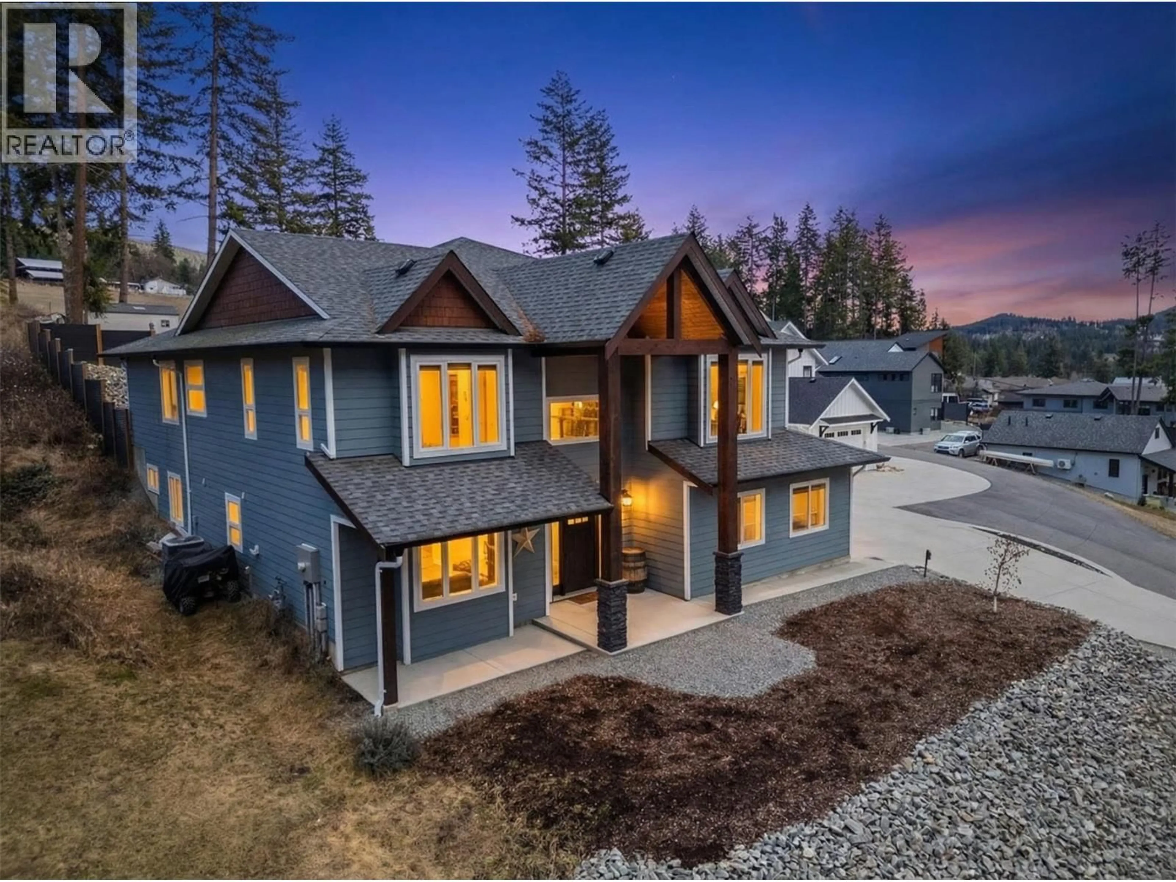 A pic from outside/outdoor area/front of a property/back of a property/a pic from drone, mountain view for 3200 20 STREET NORTHEAST, Salmon Arm British Columbia V1E2G9