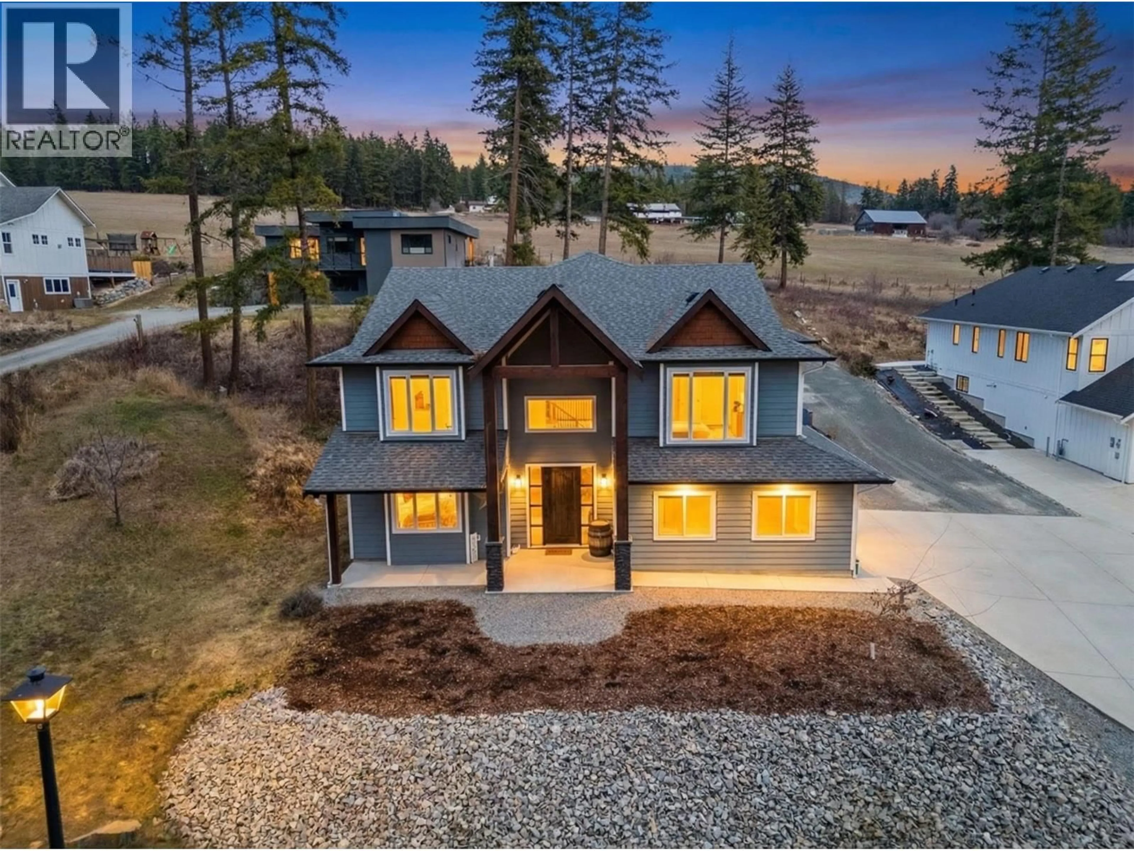 A pic from outside/outdoor area/front of a property/back of a property/a pic from drone, water/lake/river/ocean view for 3200 20 STREET NORTHEAST, Salmon Arm British Columbia V1E2G9