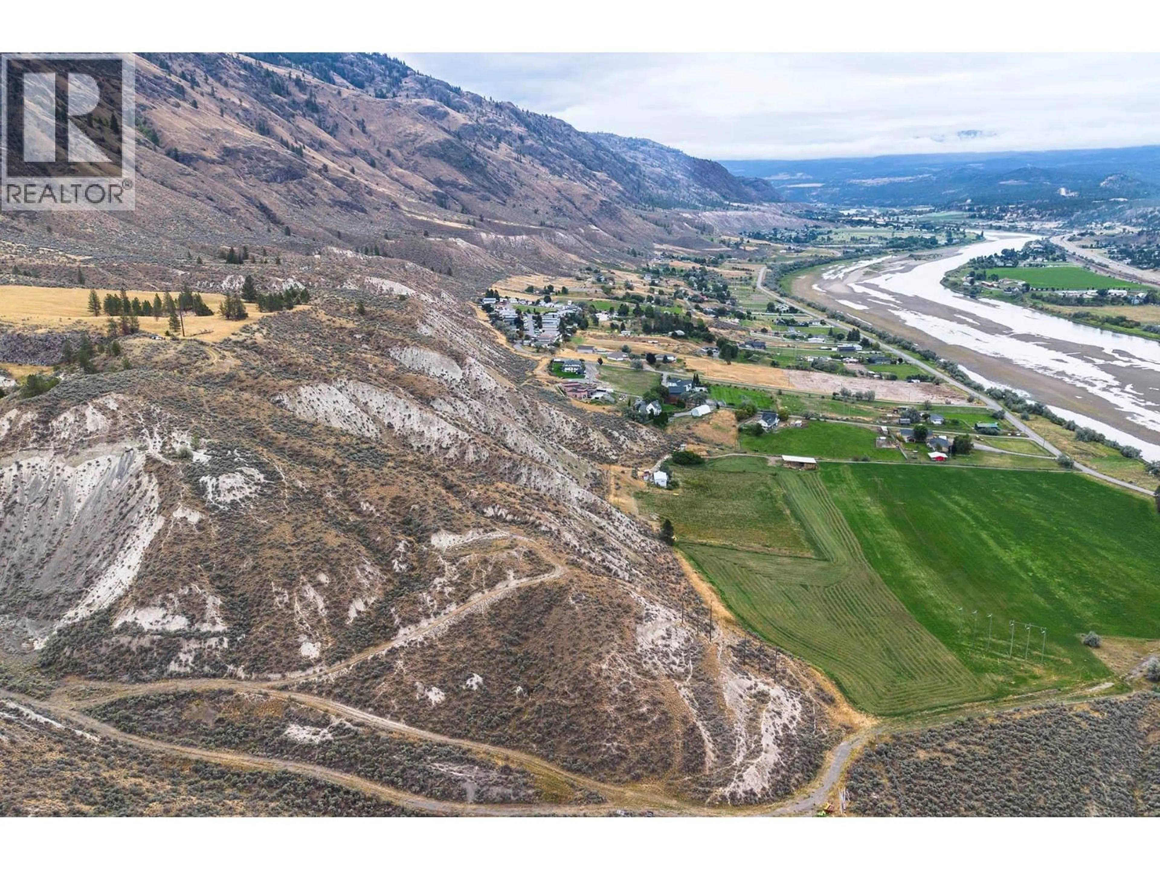 A pic from outside/outdoor area/front of a property/back of a property/a pic from drone, water/lake/river/ocean view for 3059 SHUSWAP E ROAD, Kamloops British Columbia V2C2J3