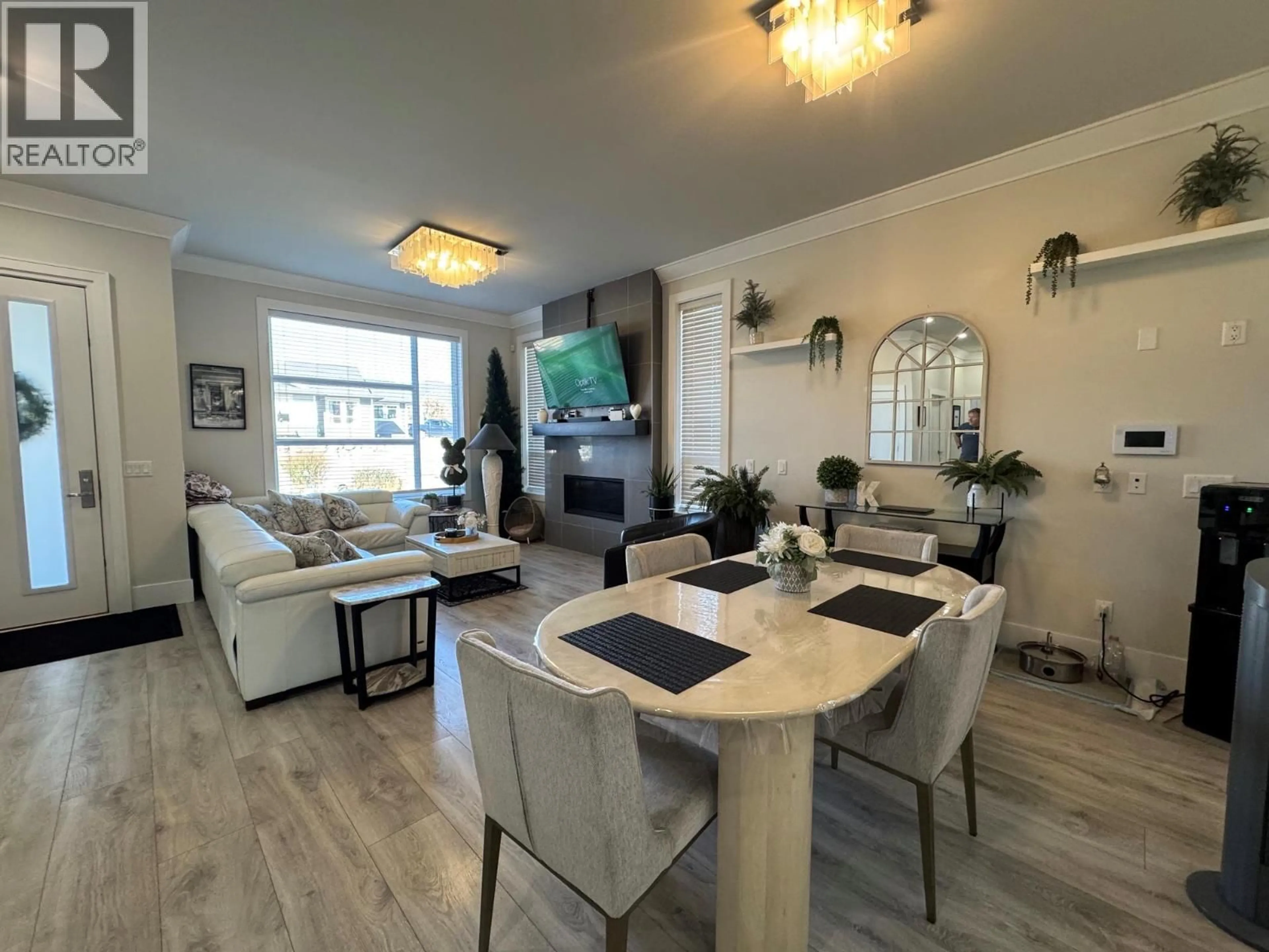 Living room with furniture, wood/laminate floor for 1610 CHESTNUT AVENUE, Merritt British Columbia V1K0A9
