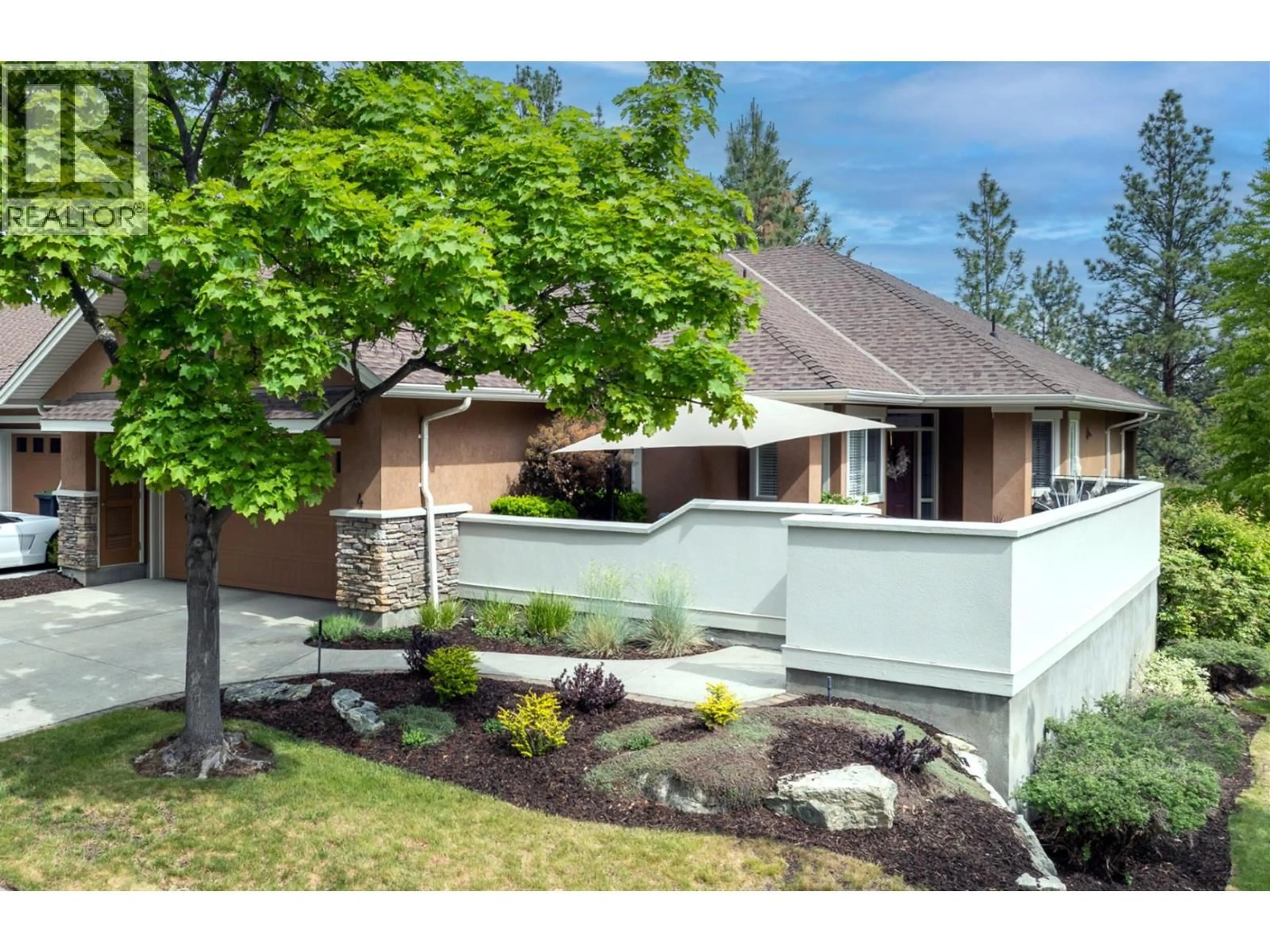 Home with vinyl exterior material, street for 4 - 4520 GALLAGHERS LOOKOUT, Kelowna British Columbia V1W3Z8
